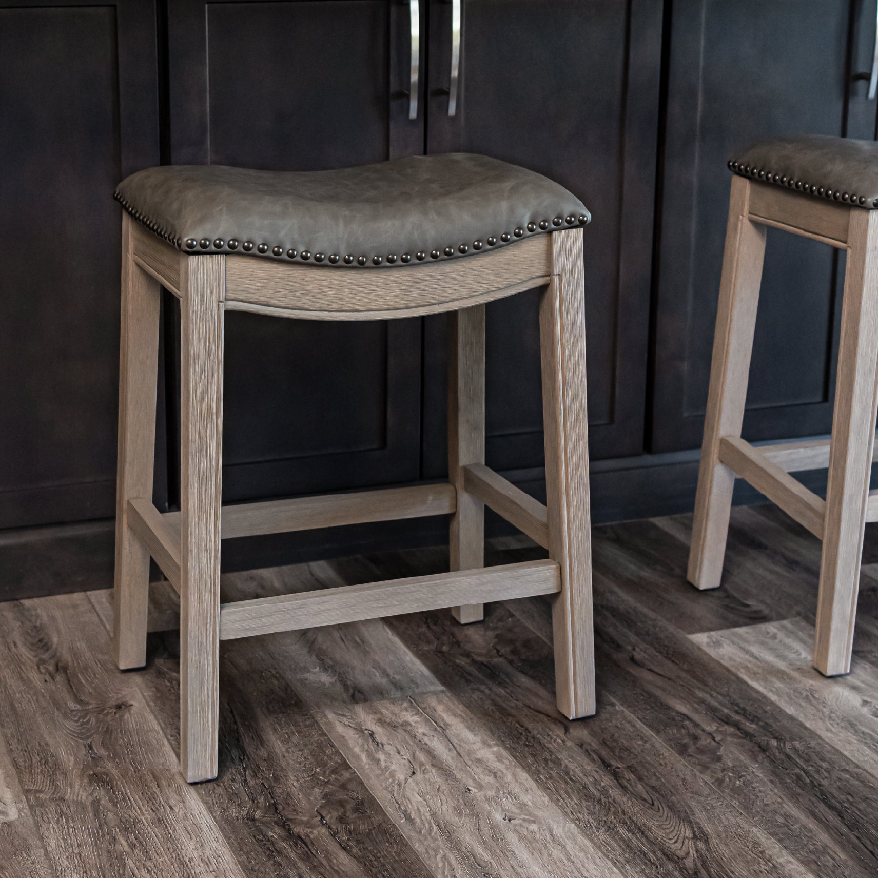 26" Adrien Saddle Counter Stool in Grey Finish with Grey Faux Leather (Set of 2) in Stools by Maven Lane