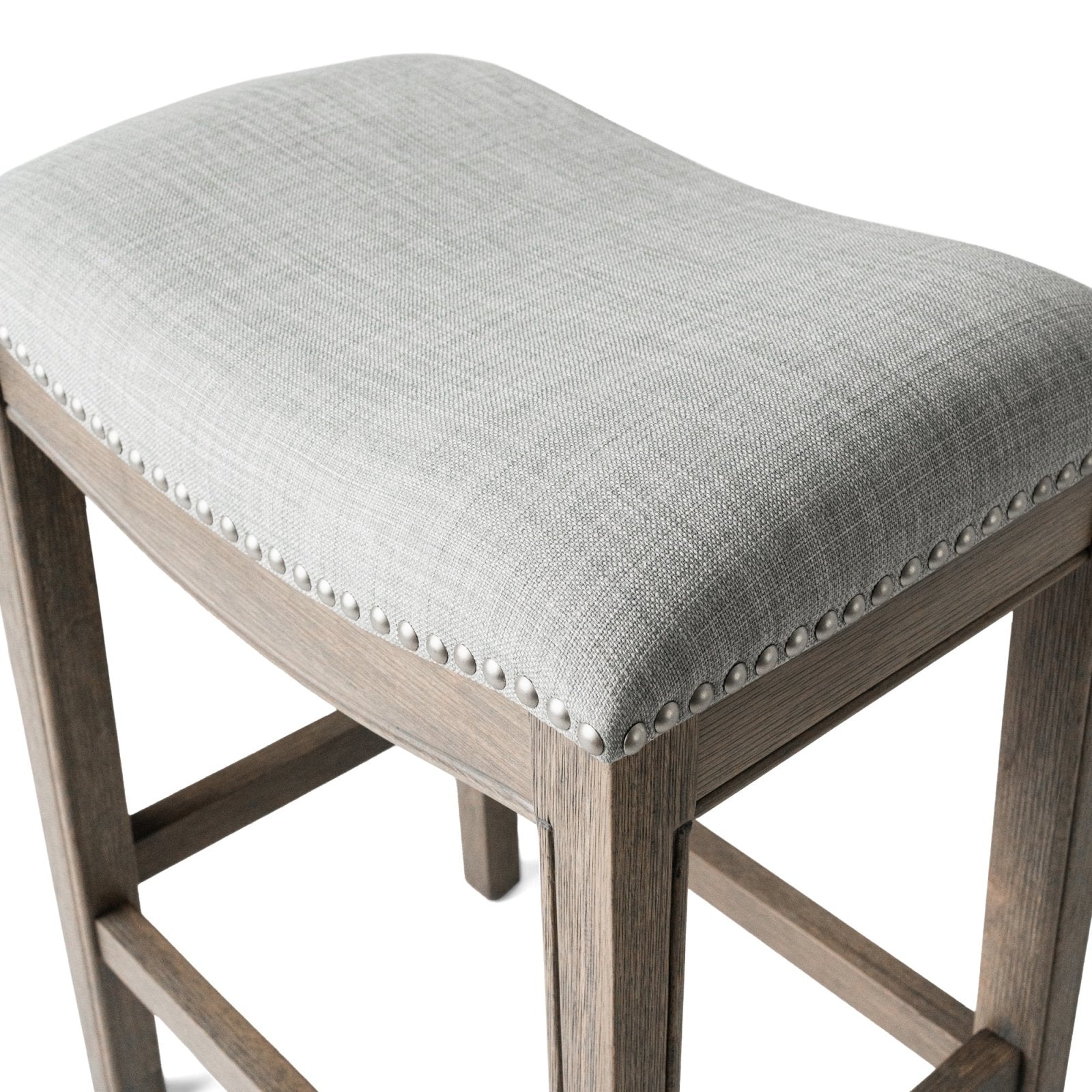 26" Adrien Saddle Counter Stool in Reclaimed Oak Finish with Ash Grey Fabric Upholstery in Stools by Maven Lane