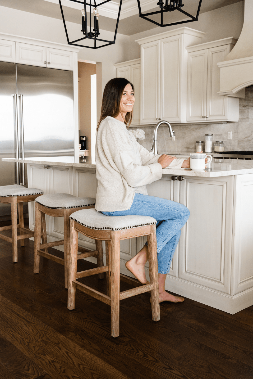 26" Adrien Saddle Counter Stool in Weathered Oak Finish with Sand Color Fabric Upholstery in Stools by Maven Lane