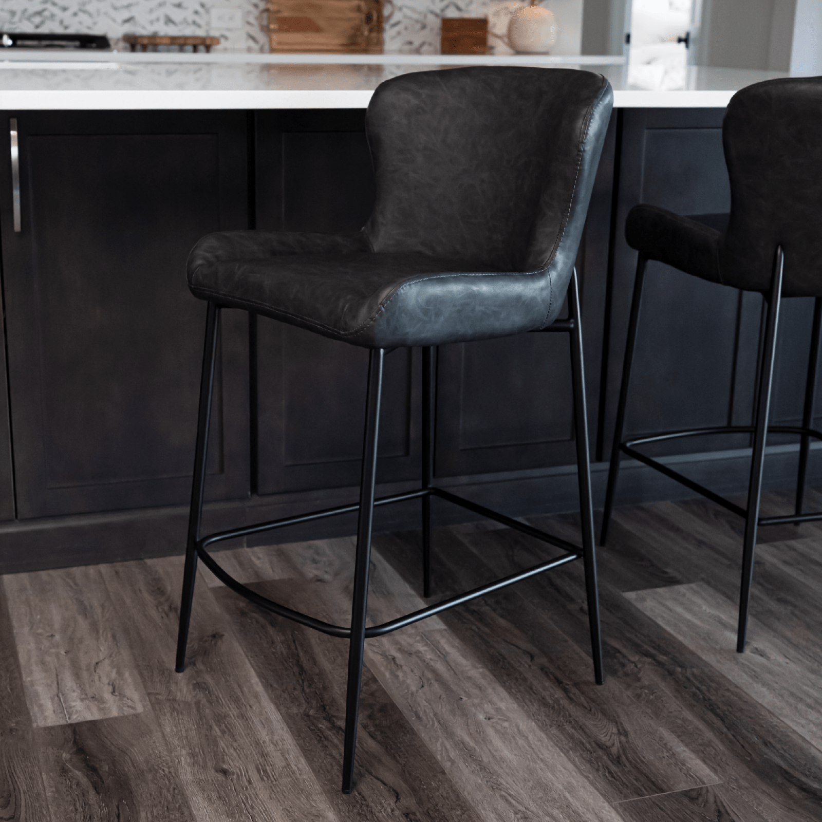 27" Naomi Counter Stool in Matte Black Finish with Charcoal Black Vegan Leather Upholstery in Stools by Maven Lane