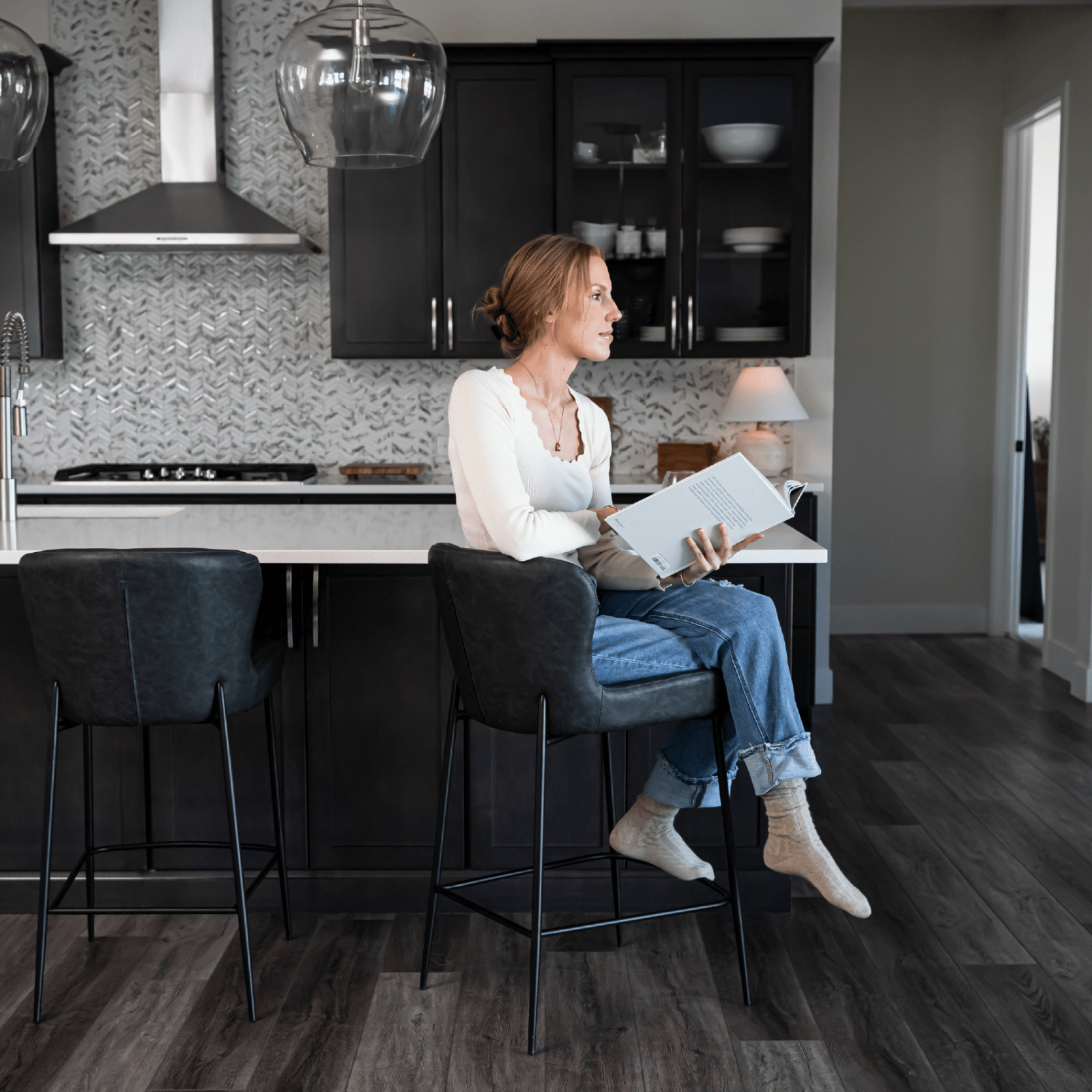 27" Naomi Counter Stool in Matte Black Finish with Charcoal Black Vegan Leather Upholstery in Stools by Maven Lane