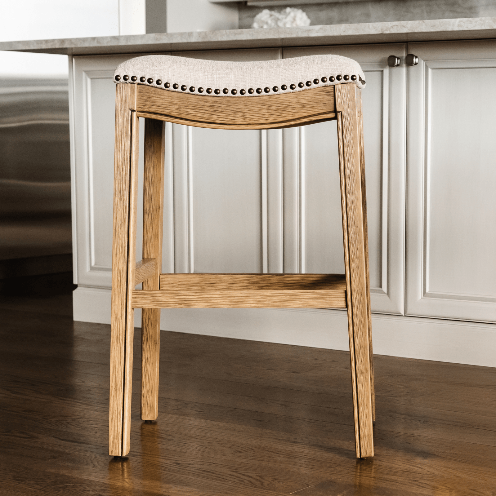 31" Adrien Saddle Bar Stool in Natural Wood Finish with Wheat Fabric Upholstery in Stools by Maven Lane
