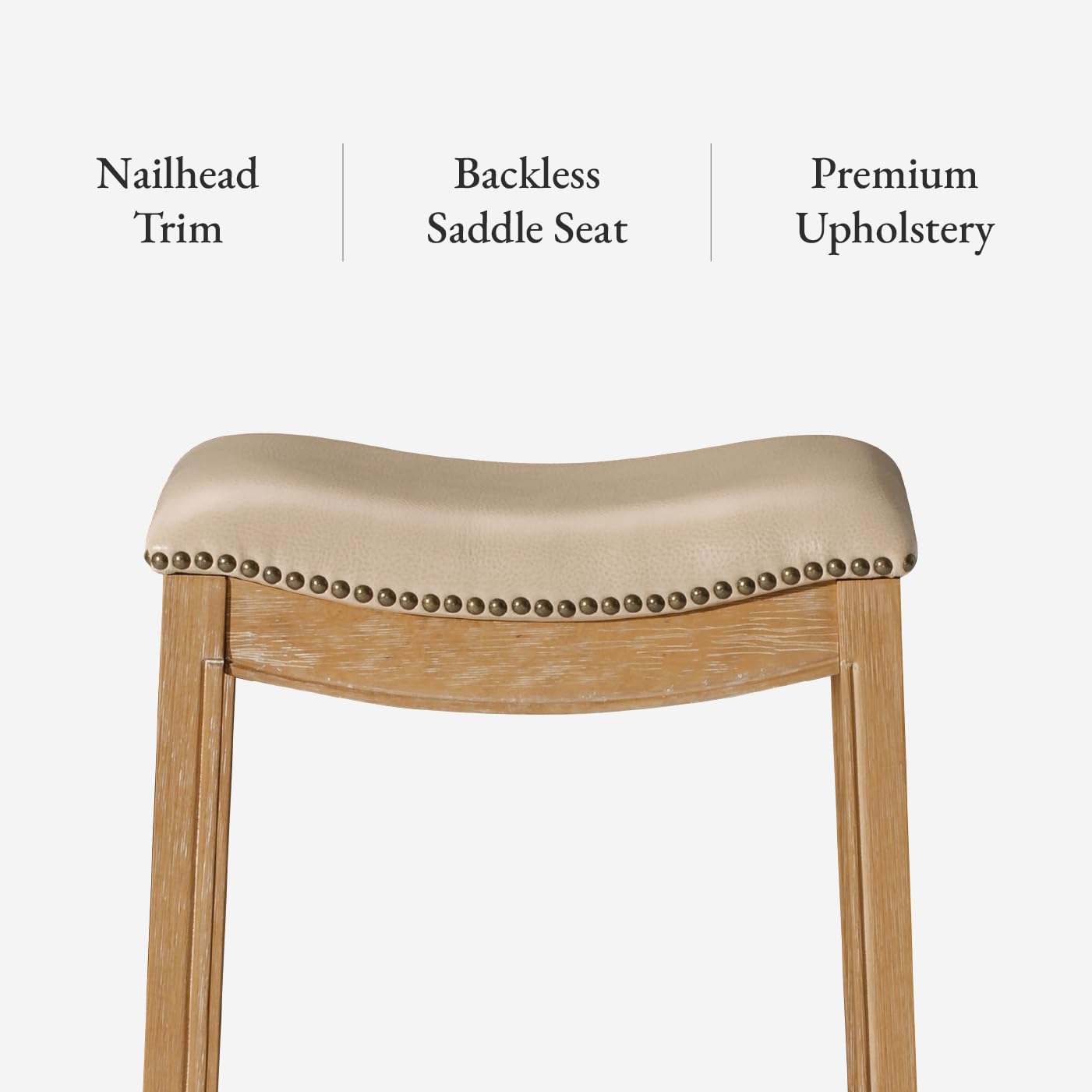 Adrien Saddle Bar Stool in Natural Finish with Beige Faux Leather in Stools by Maven Lane