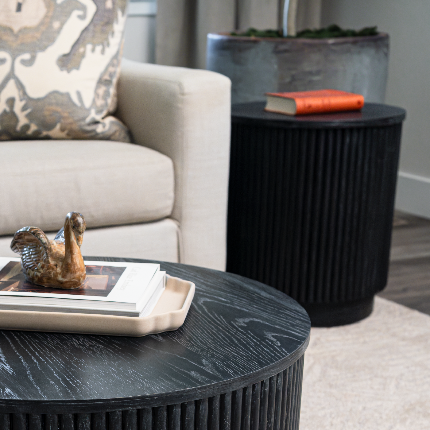 Dallas round side table in aged black in Side Table by Maven Lane