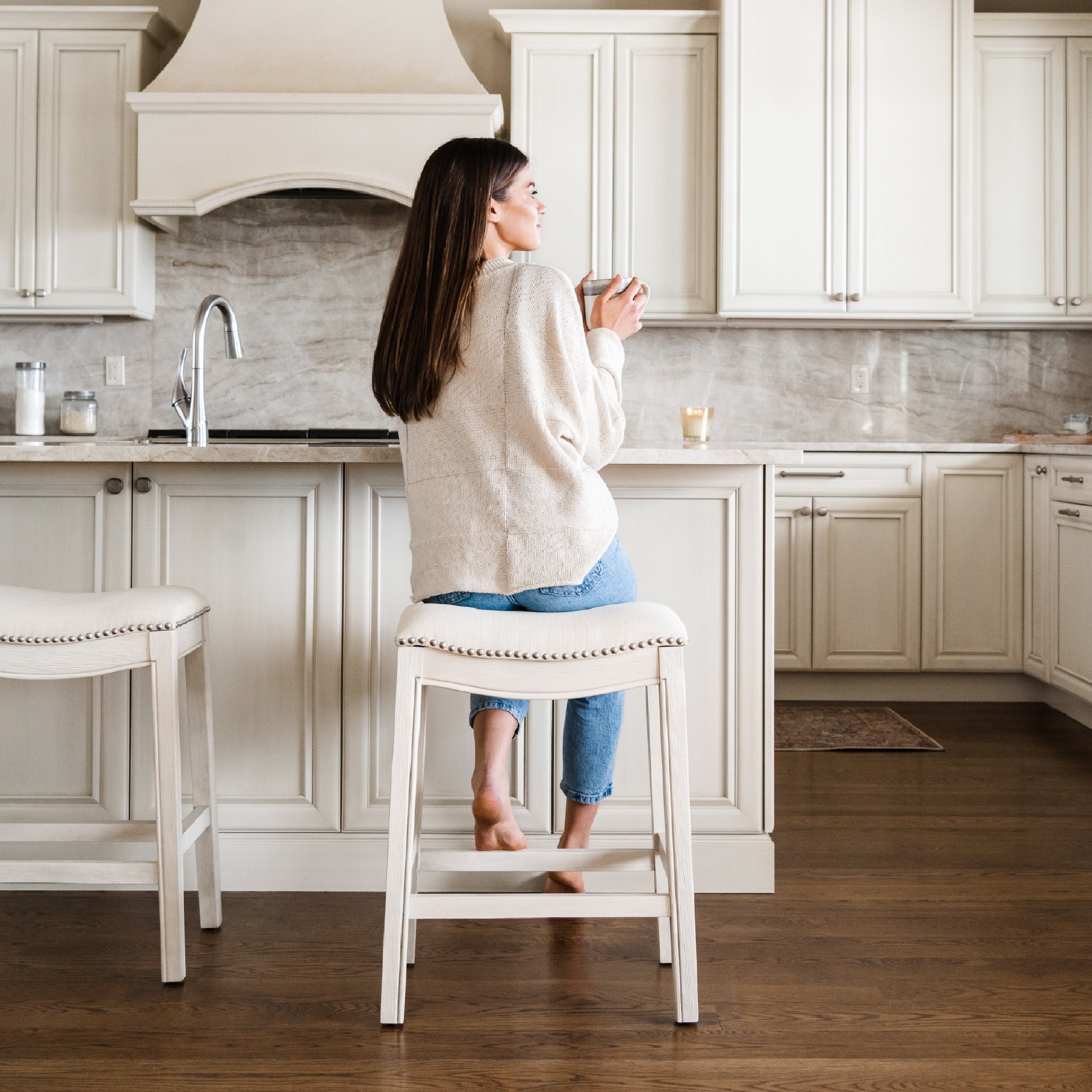 26" Adrien Saddle Counter Stool in Cream Finish with Natural Fabric (Set of 2) in Stools by Maven Lane