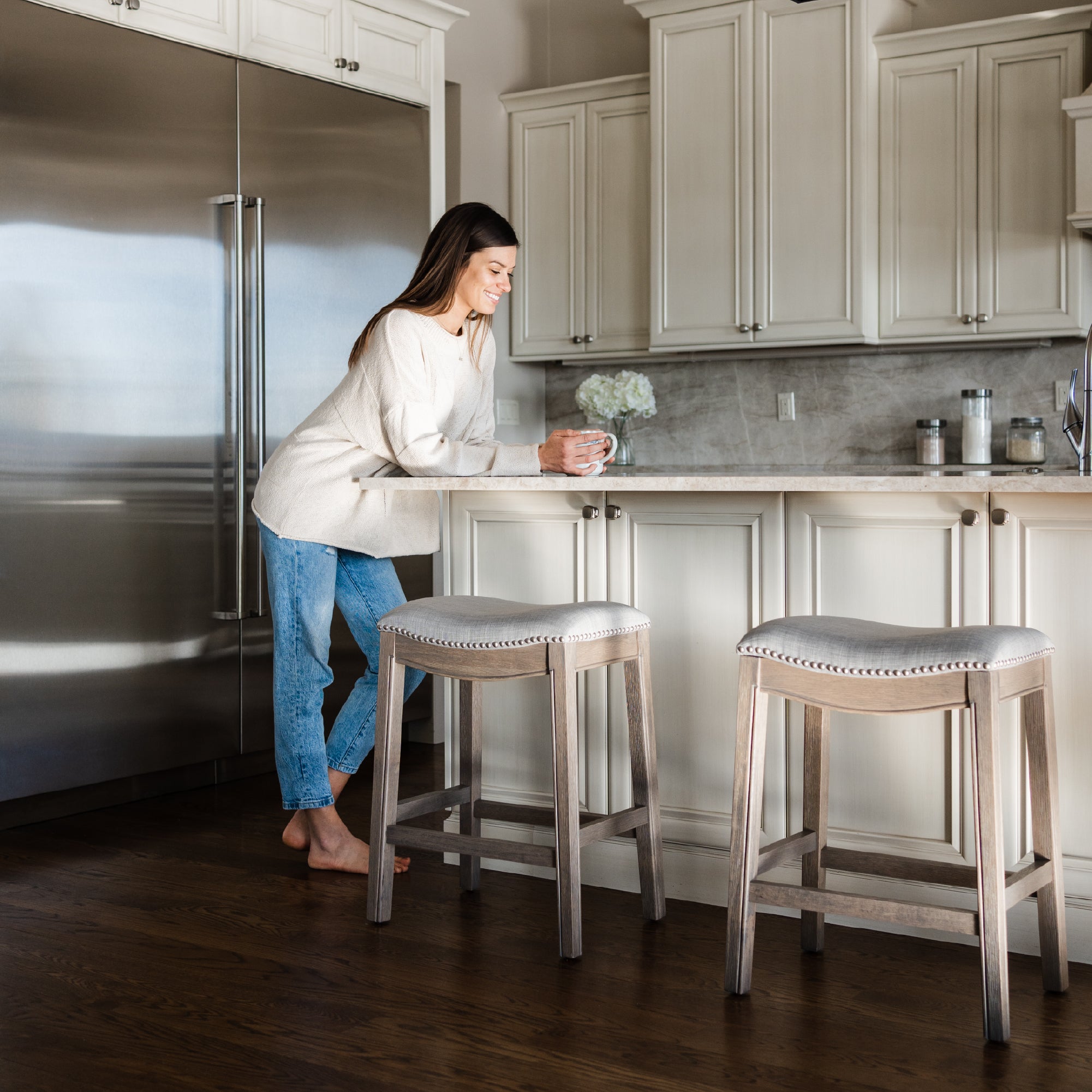 26" Adrien Saddle Counter Stool in Reclaimed Oak Finish with Ash Grey Fabric Upholstery in Stools by Maven Lane