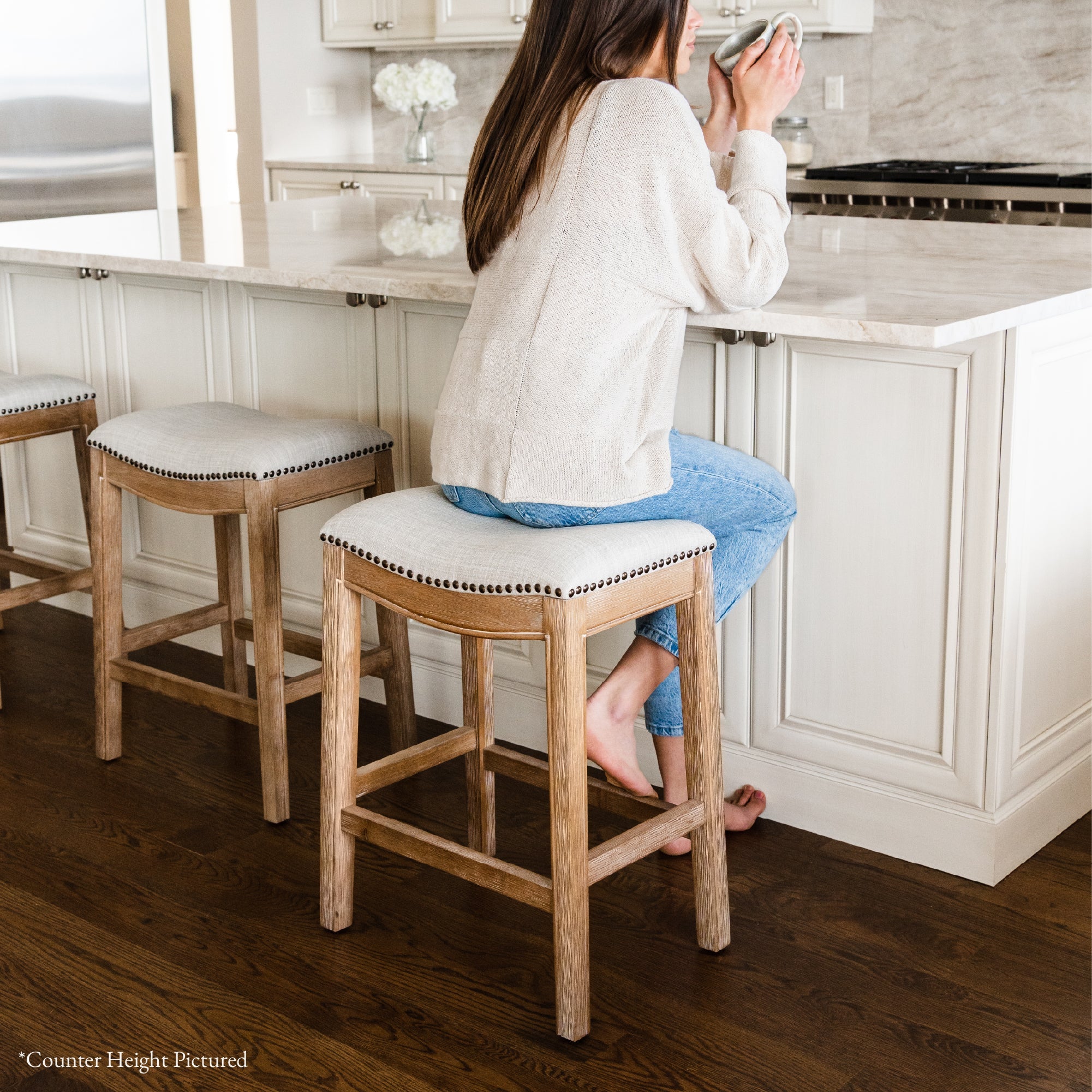 31" Adrien Saddle Bar Stool in Weathered Oak Finish with Sand Color Fabric Upholstery in Stools by Maven Lane