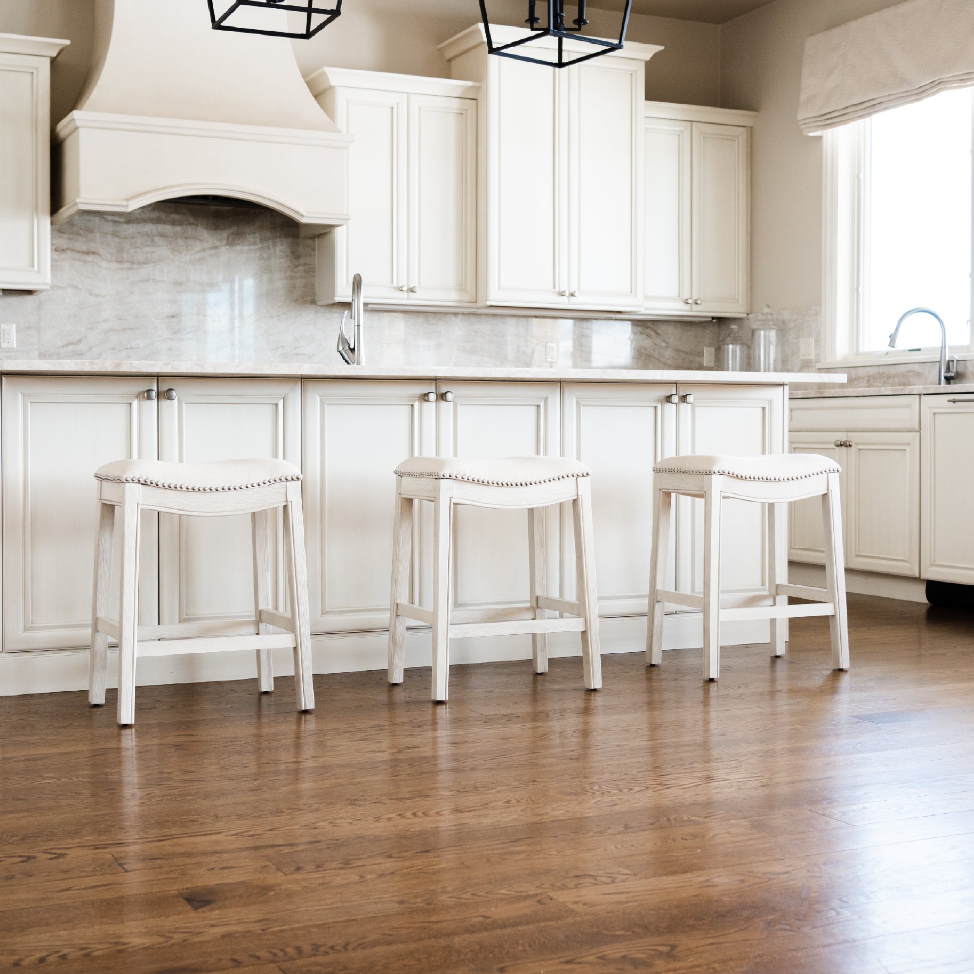 26" Adrien Saddle Counter Stool in Cream Finish with Natural Fabric (Set of 3) in Stools by Maven Lane