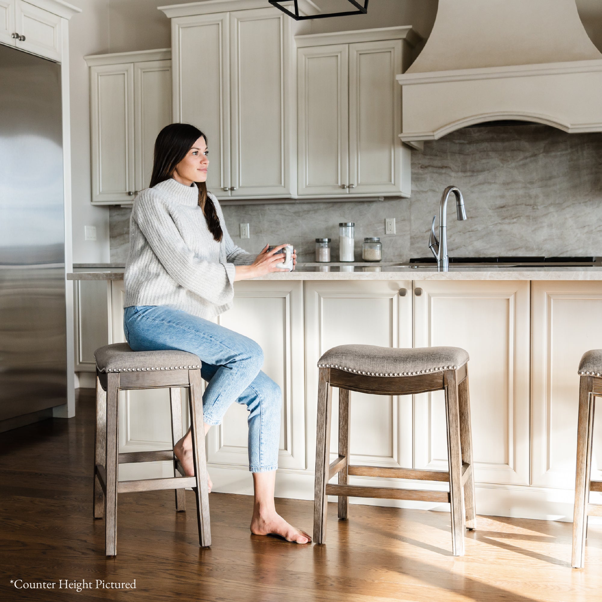 31" Adrien Saddle Bar Stool in Walnut Finish with Grey Fabric Upholstery in Maven Lane by Maven Lane