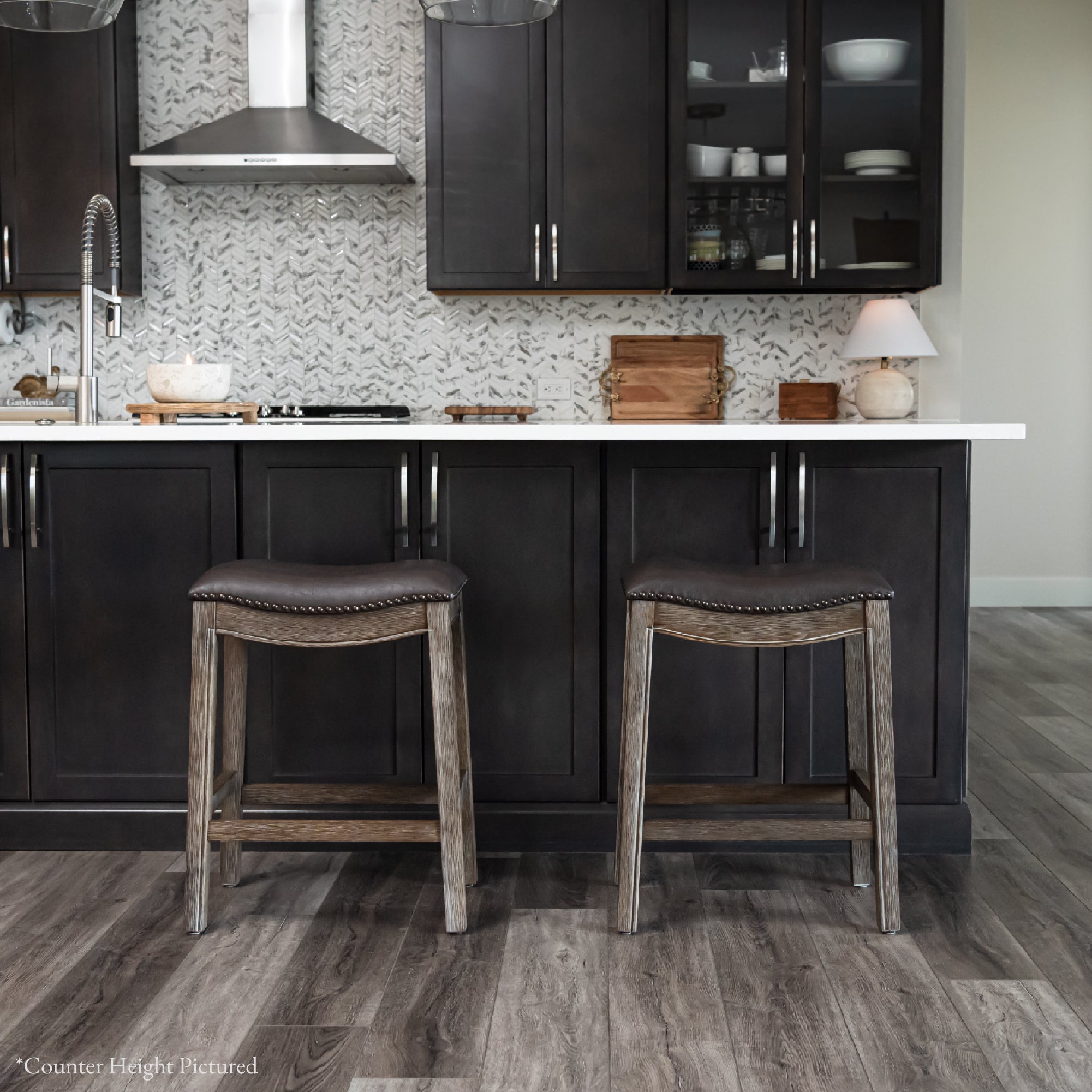 31" Adrien Saddle Bar Stool in Brown Finish with Dark Brown Faux Leather (Set of 3) in Stools by Maven Lane