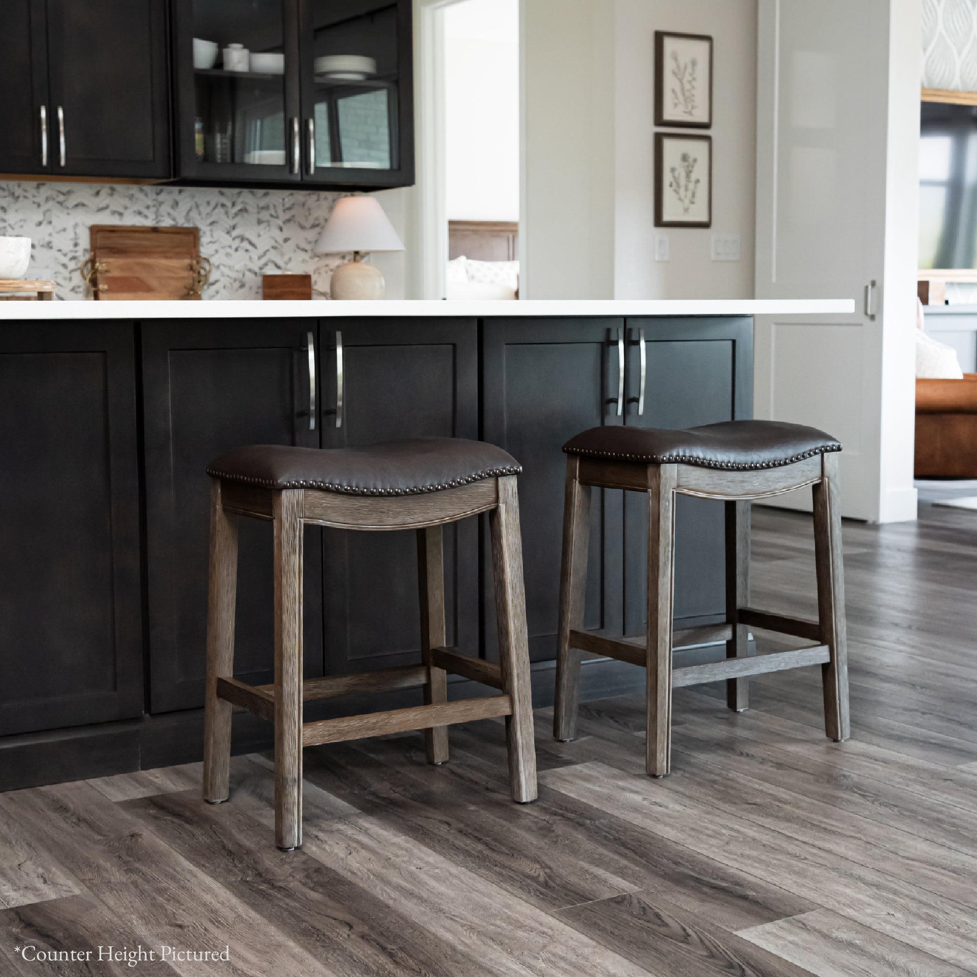 31" Adrien Saddle Bar Stool in Brown Finish with Dark Brown Faux Leather (Set of 3) in Stools by Maven Lane