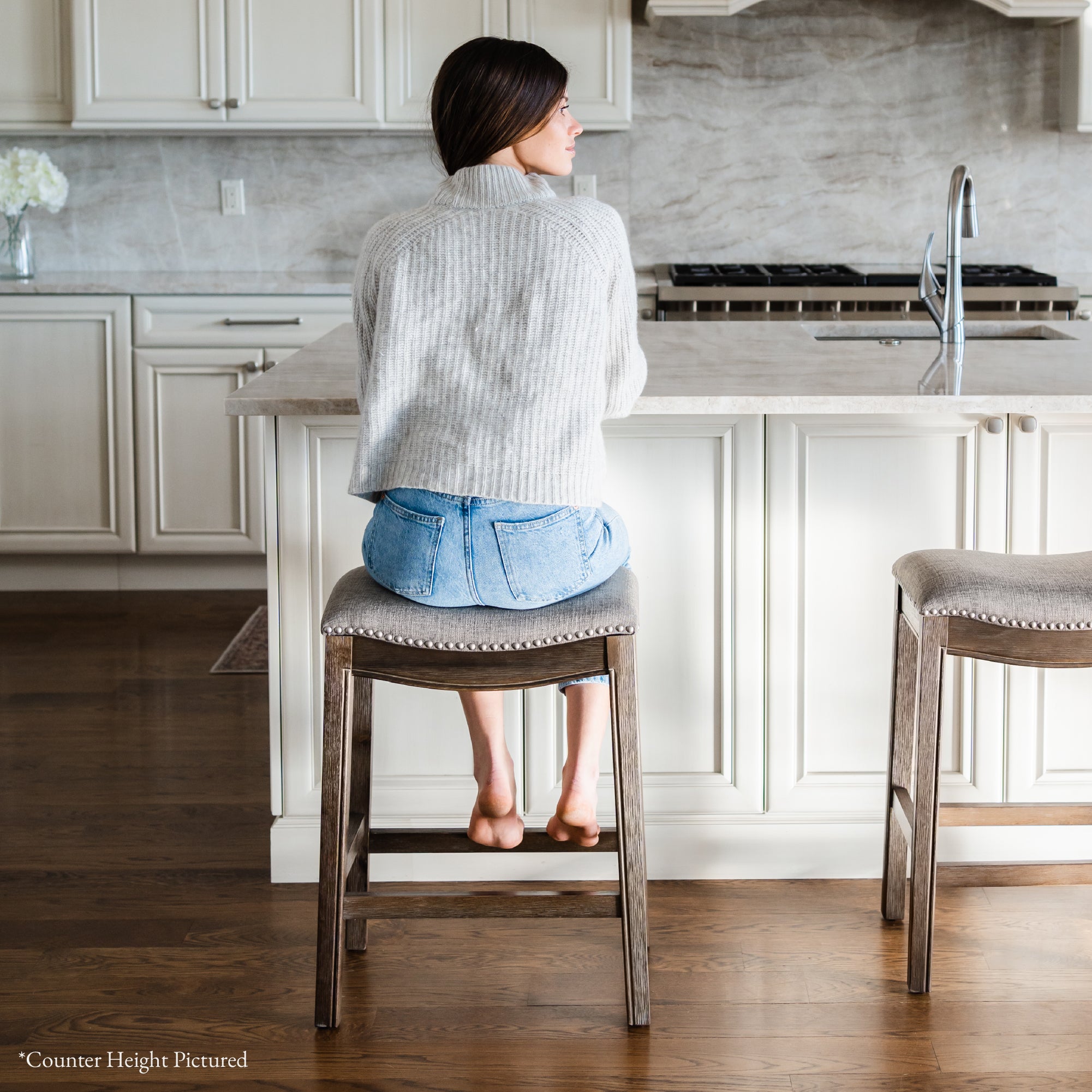 31" Adrien Saddle Bar Stool in Walnut Finish with Grey Fabric Upholstery in Maven Lane by Maven Lane