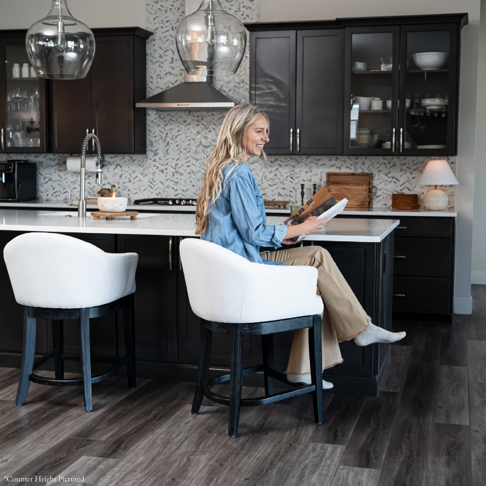30" Isabella Swivel Bar Stool in Aged Black Finish with Snow White Fabric in Stools by Maven Lane