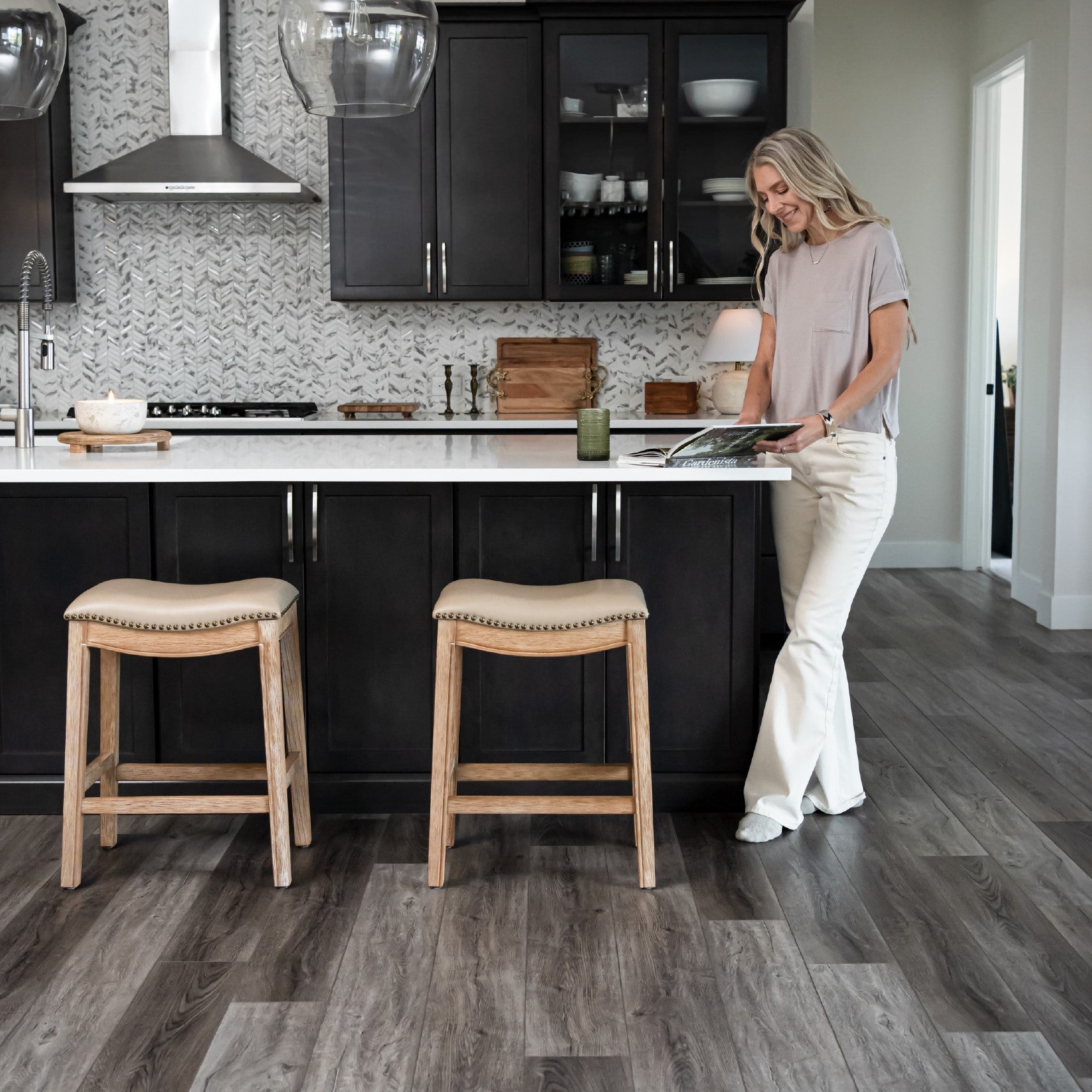 Adrien Saddle Counter Stool in Natural Finish with Beige Faux Leather in Stools by Maven Lane