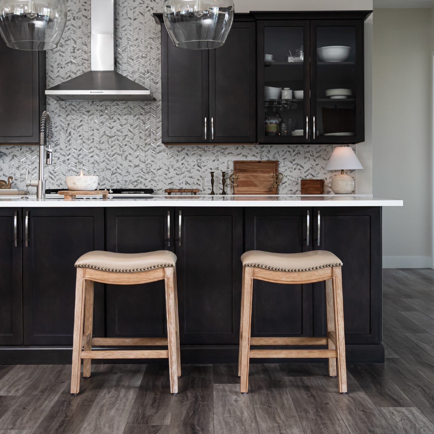 Adrien Saddle Counter Stool in Natural Finish with Beige Faux Leather in Stools by Maven Lane