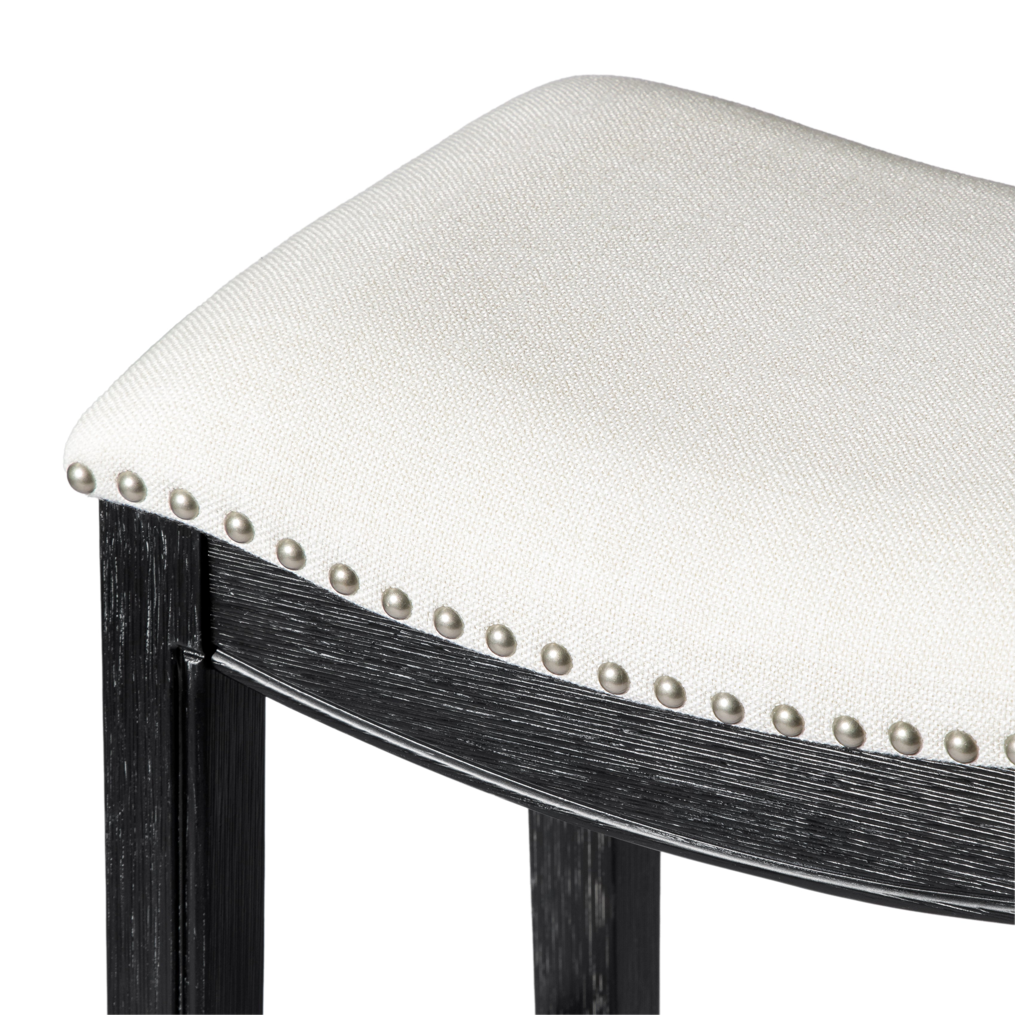 Adrien Saddle Bar Stool In Aged Black Finish With Snow White Fabric Upholstery in Stools by Maven Lane