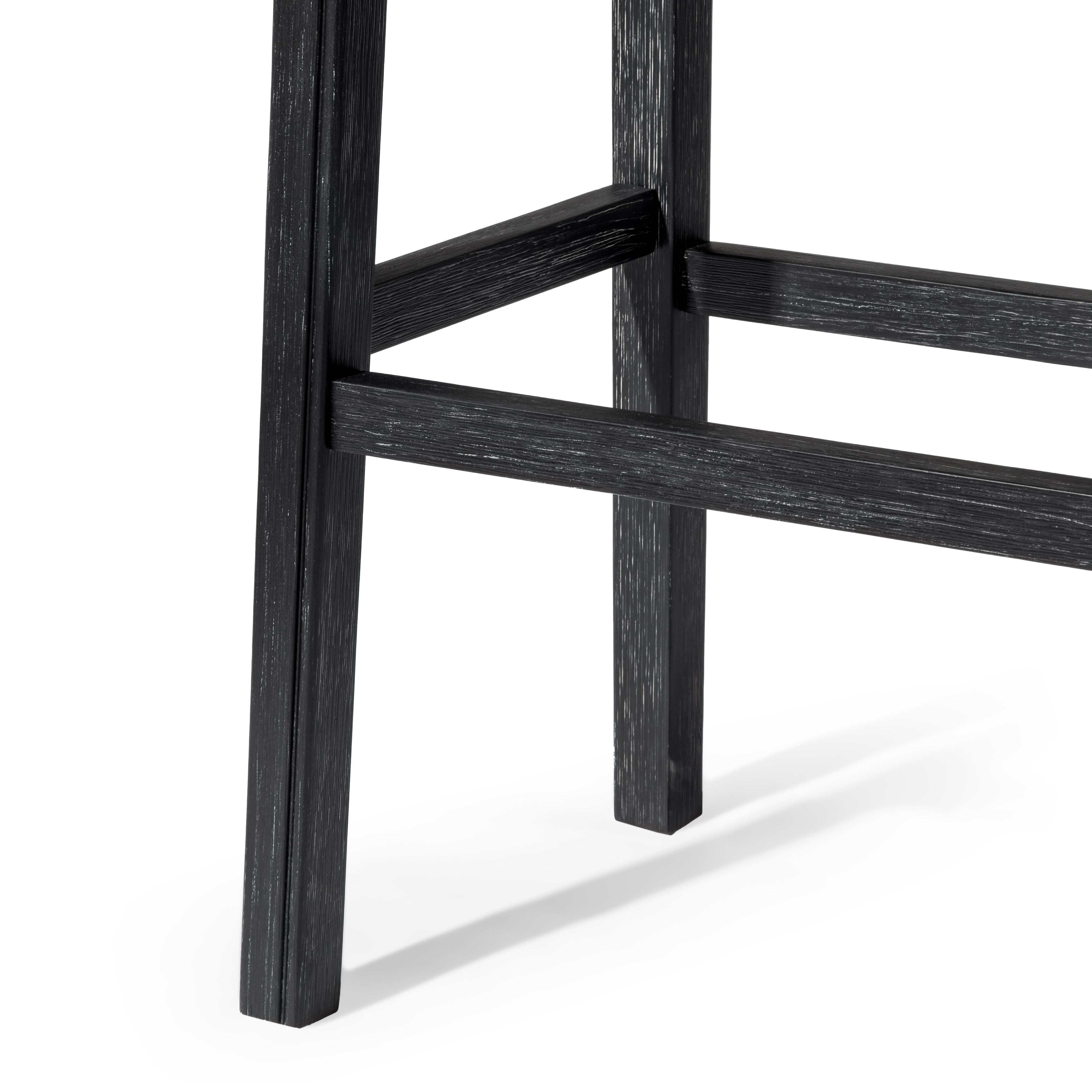 Adrien Saddle Bar Stool In Aged Black Finish With Charcoal Black Vegan Leather in Stools by Maven Lane