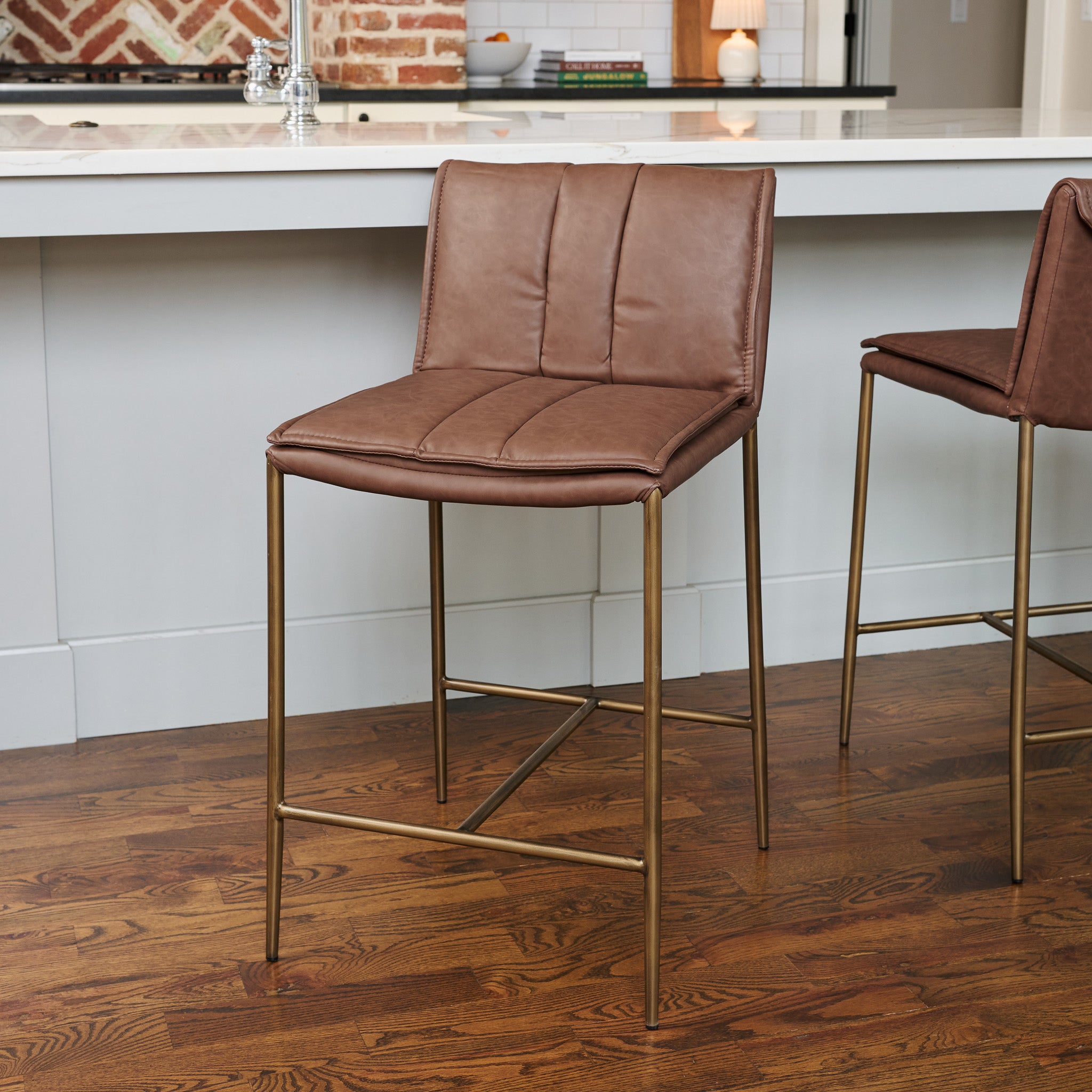 25" Gerard Counter Stool in Aged Gold Finish with Brown Faux Leather in Stools by Maven Lane