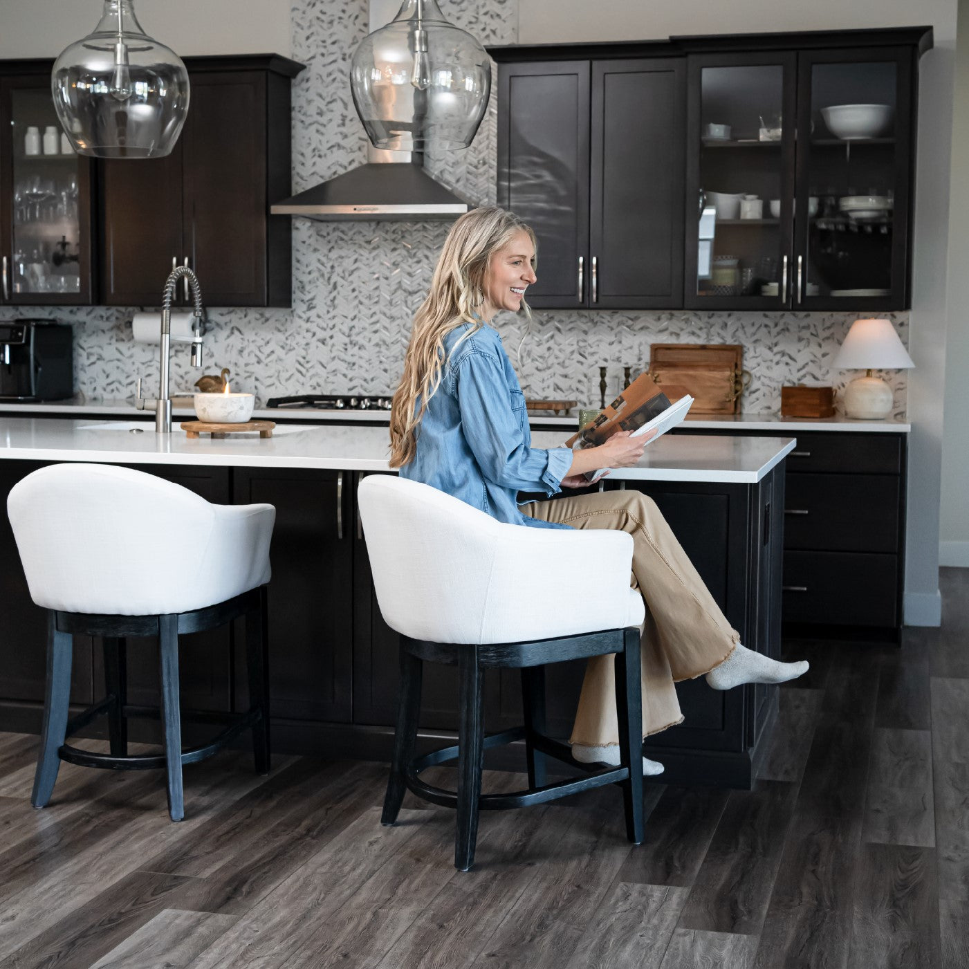 26" Isabella Swivel Counter Stool in Aged Black Finish with Snow White Fabric in Stools by Maven Lane