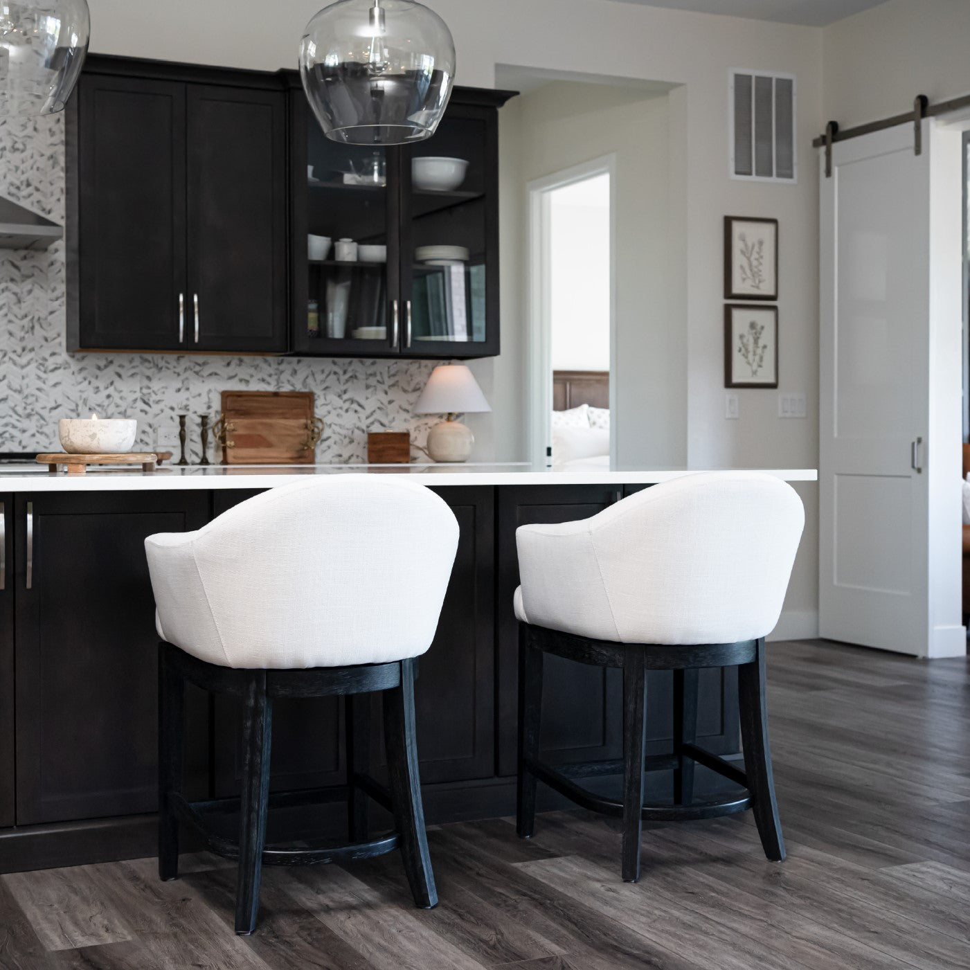 26" Isabella Swivel Counter Stool in Aged Black Finish with Snow White Fabric in Stools by Maven Lane