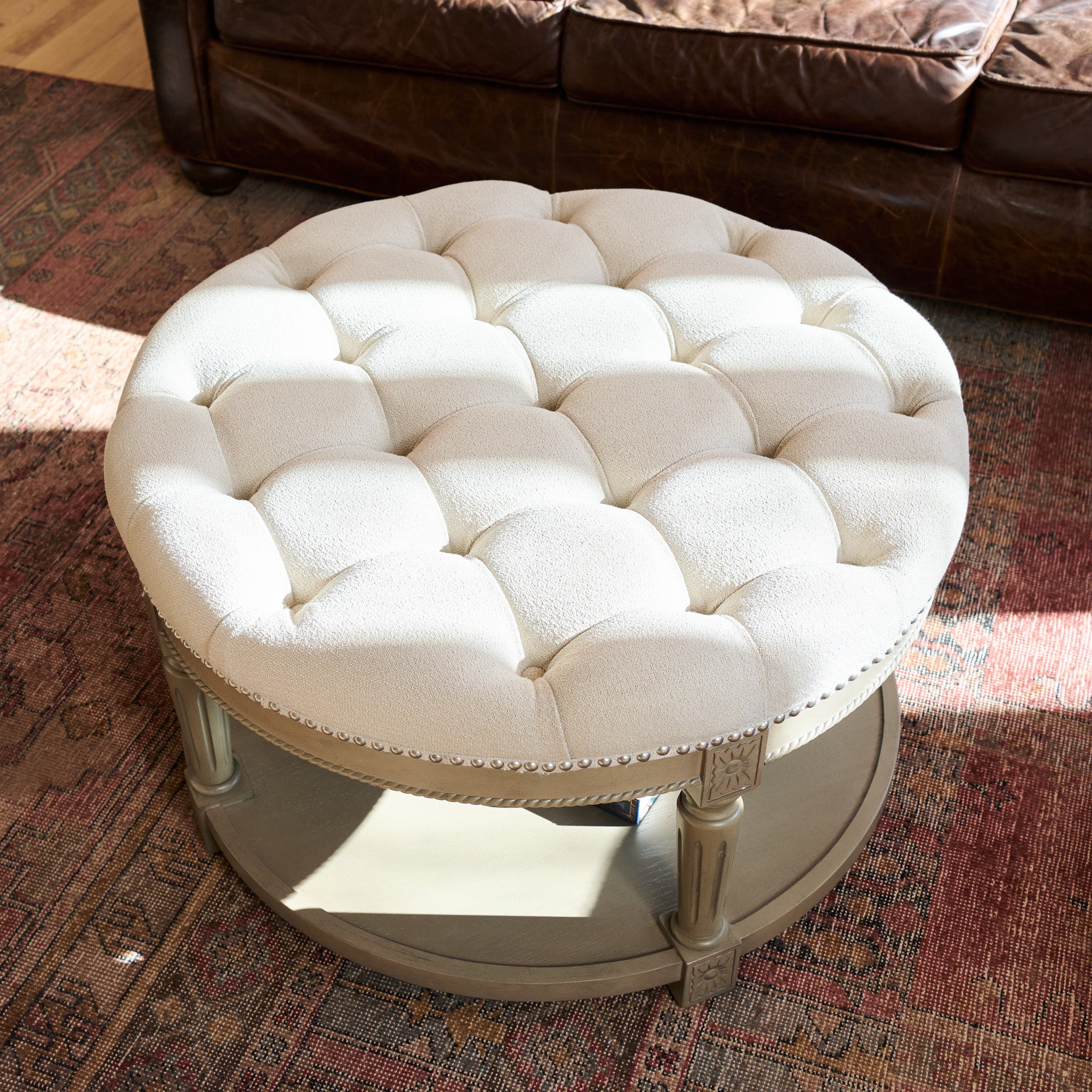 Mesa Round Upholstered Coffee Table in Grey Finish with Grey Fabric in Coffee Table by Maven Lane