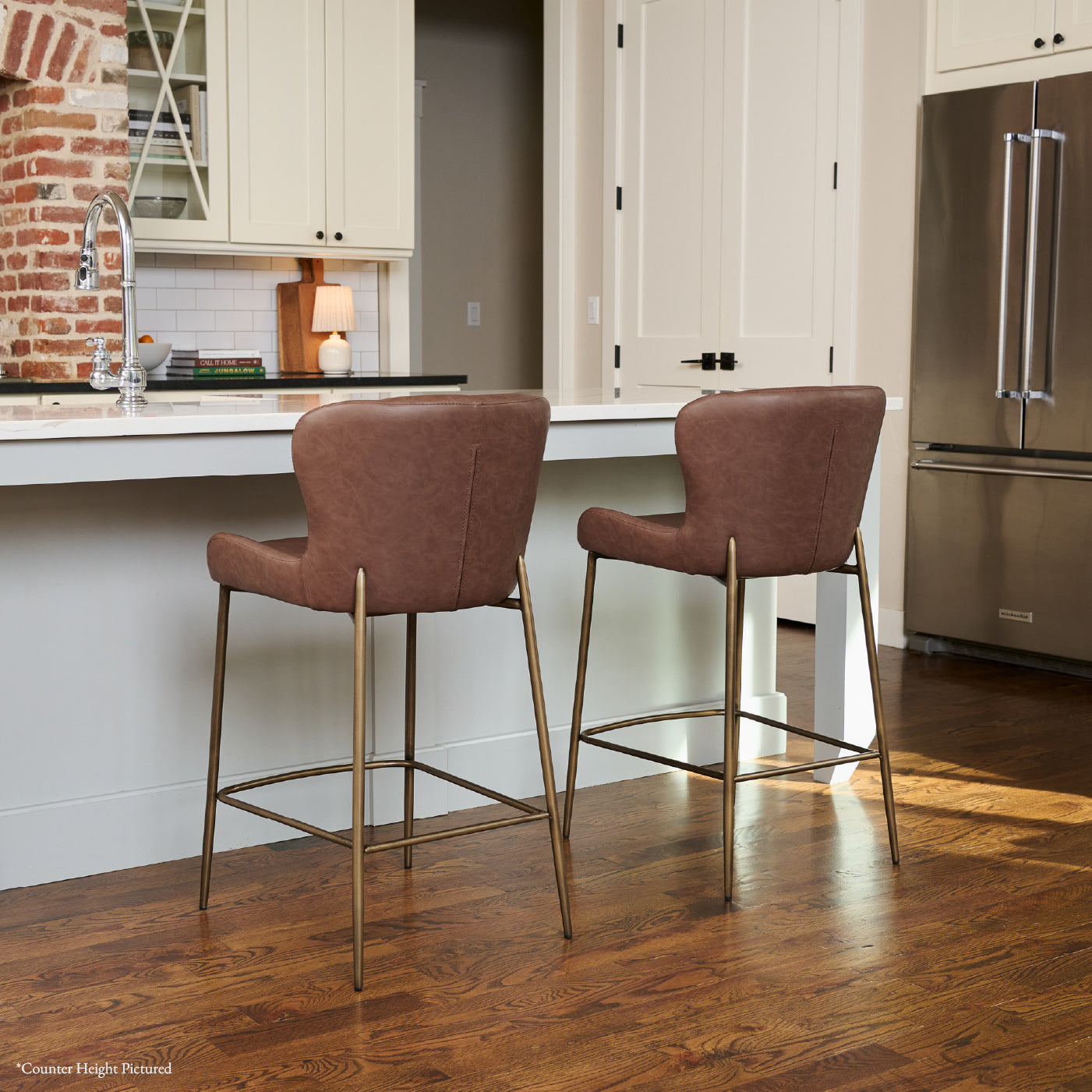 Naomi Bar Stool in Aged Gold Finish with Brown Faux Leather in Stools by Maven Lane