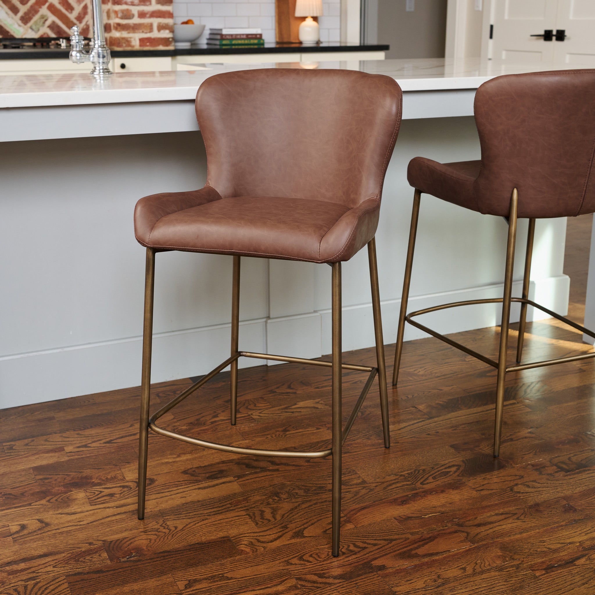 26" Naomi Counter Stool in Aged Gold Finish with Brown Faux Leather in Stools by Maven Lane