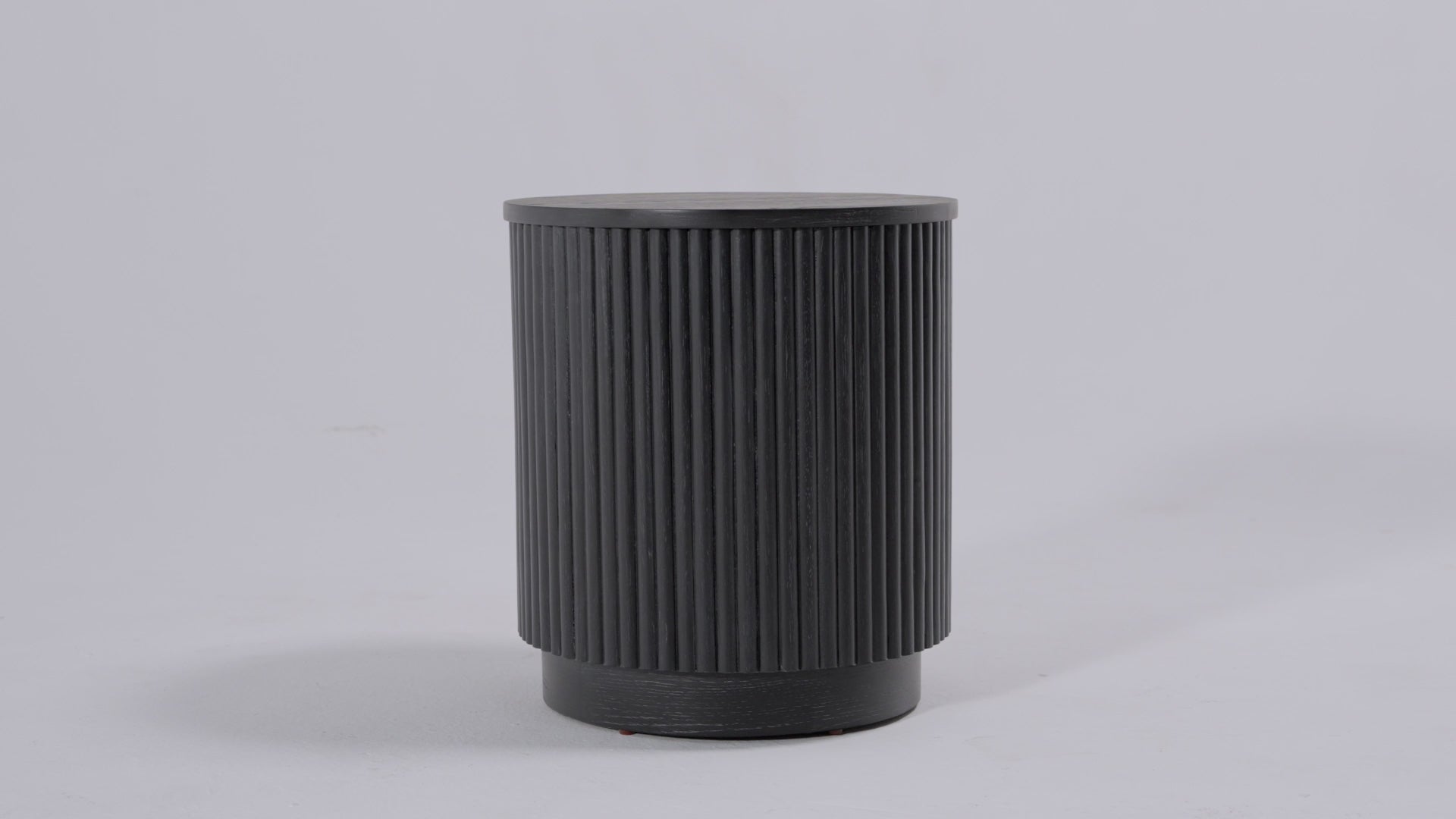 Dallas round side table in aged black in Side Table by Maven Lane