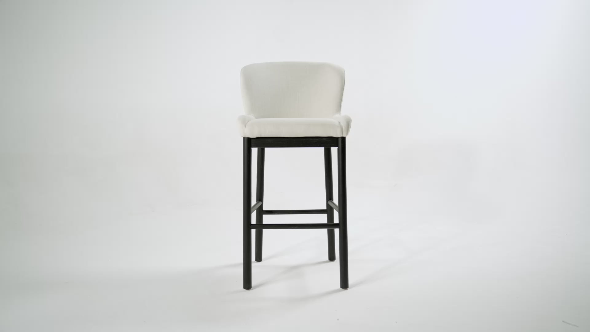 Gia Bar Stool in Aged Black Finish With Dove Weave Fabric in Stools by Maven Lane