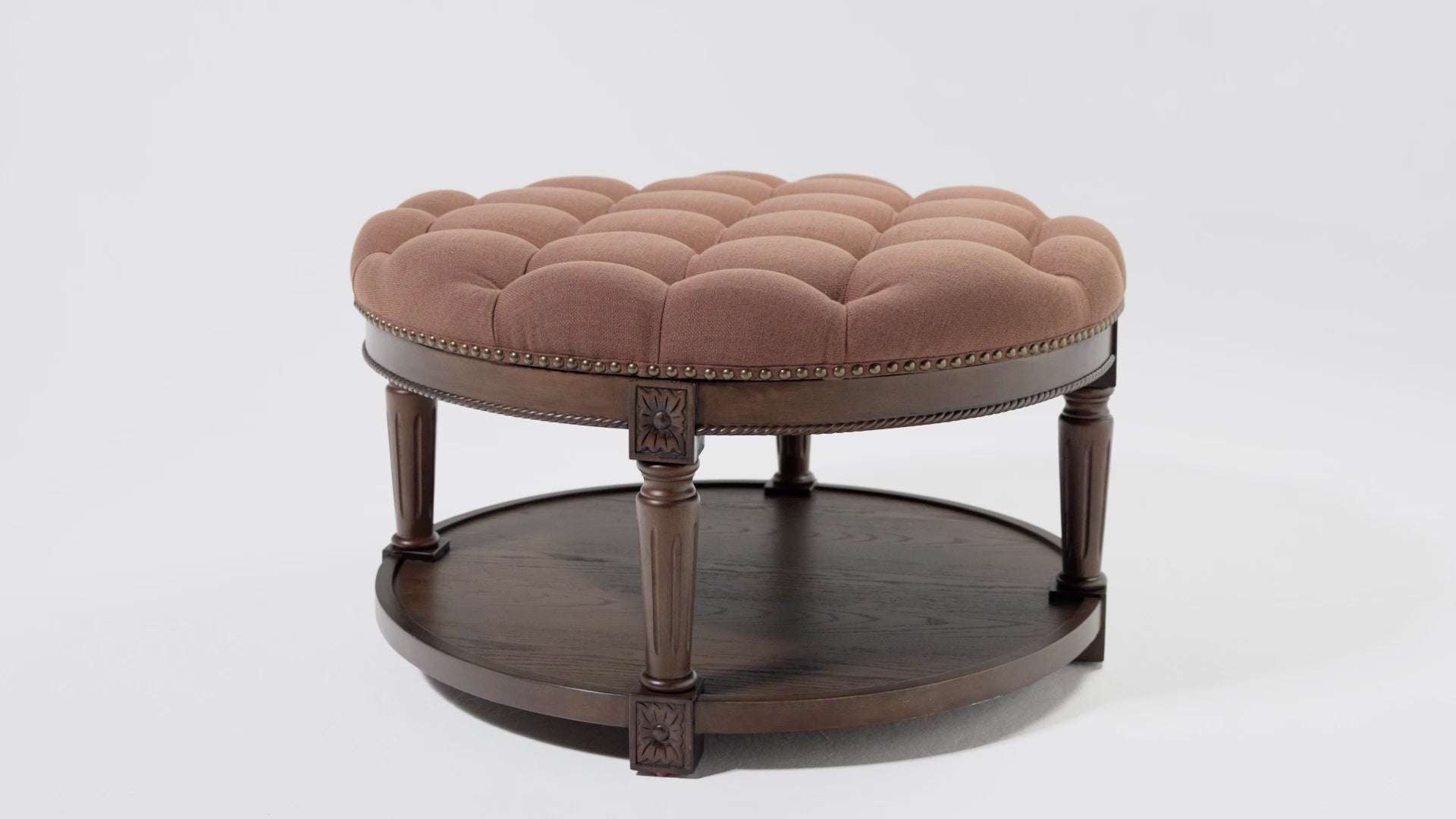 Mesa Round Upholstered Coffee Table in Aged Brown with Clay Brown Fabric in Coffee Table by Maven Lane