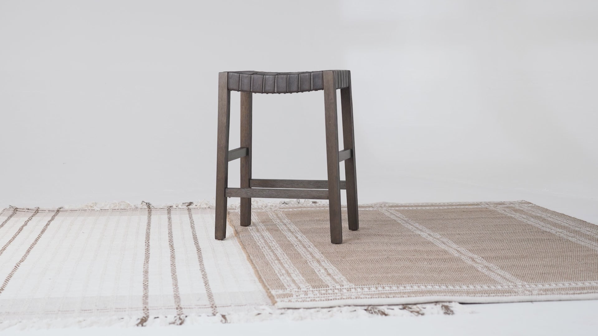 26" Emerson Counter Stool in Weathered Brown Wood Finish with Marksman Saddle Vegan Leather in Stools by Maven Lane