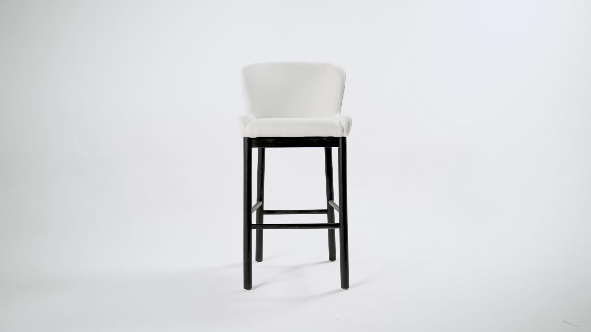 30" Isabella Swivel Bar Stool in Aged Black Finish with Snow White Fabric in Maven Lane by Maven Lane