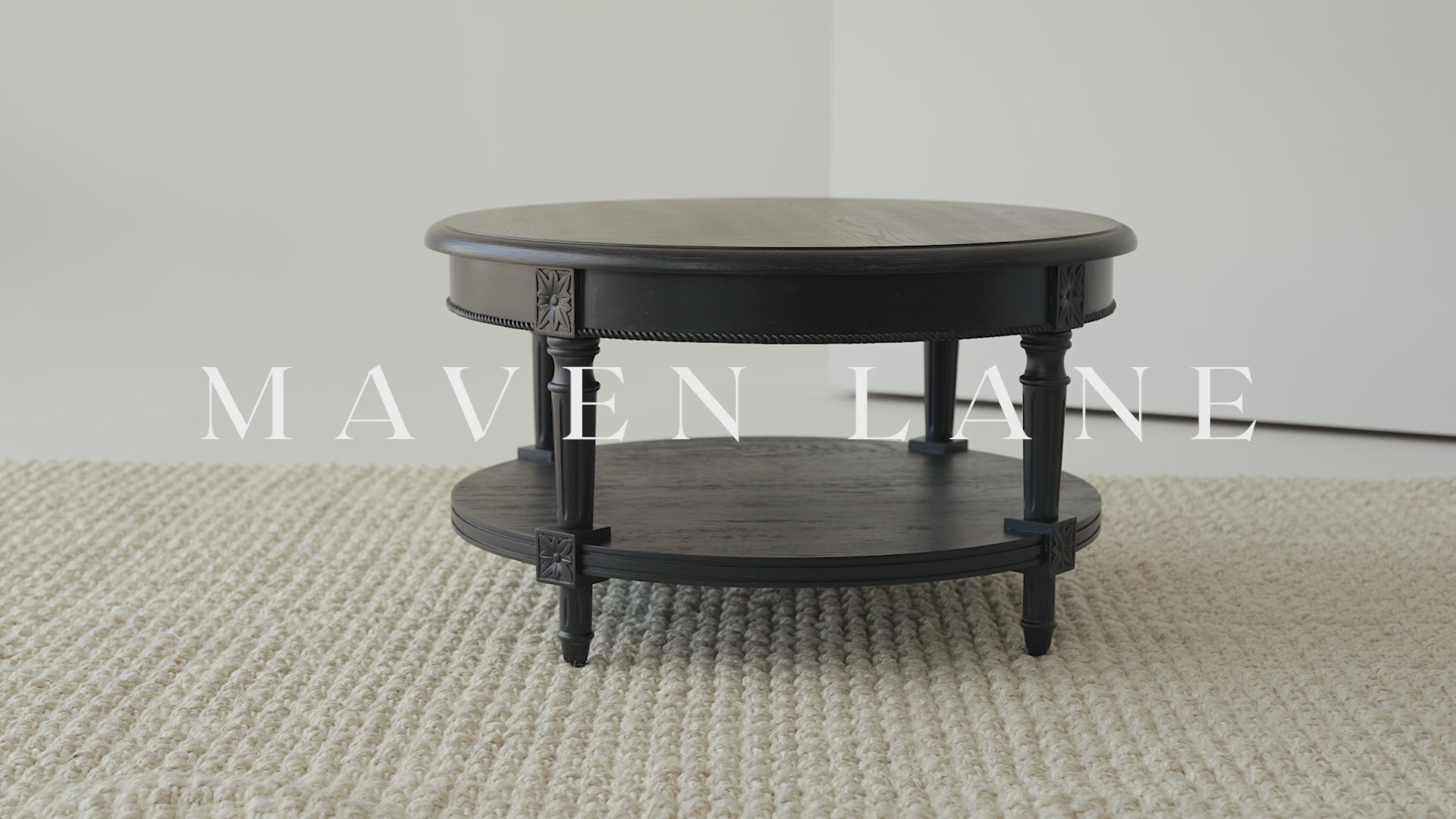 Pullman Traditional Round Wooden Coffee Table in Antiqued Black Finish in Coffee Table by Maven Lane