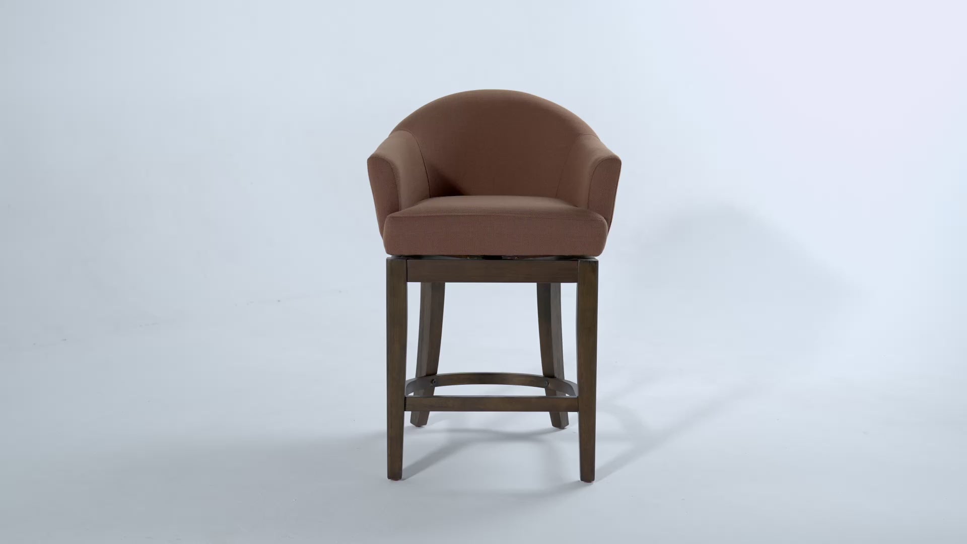 26" Isabella swivel counter height kitchen stool - aged brown finish with clay canvas fabric in Maven Lane by Maven Lane