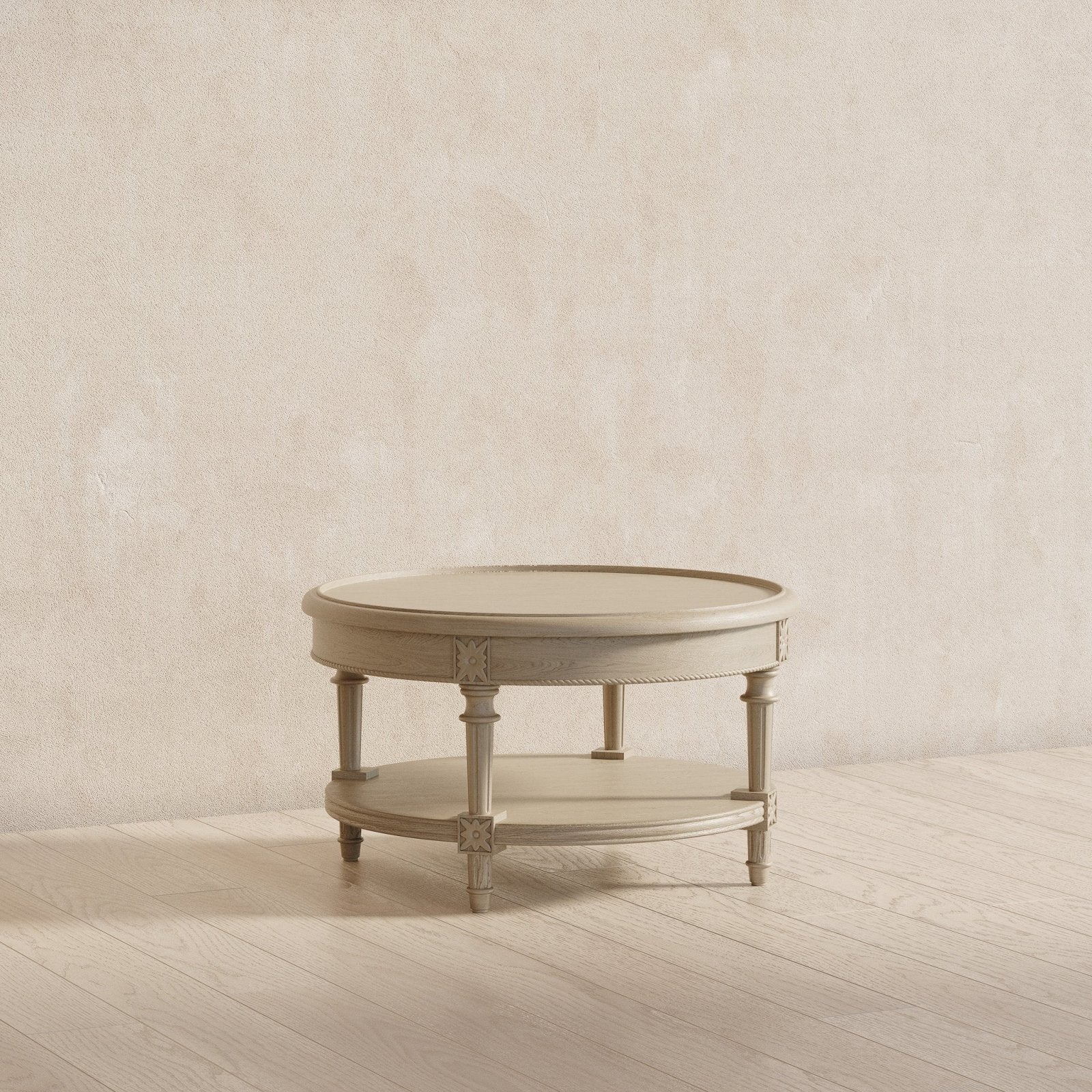 Pullman Traditional Round Wooden Coffee Table in Antiqued White Finish in Accent Tables by Maven Lane