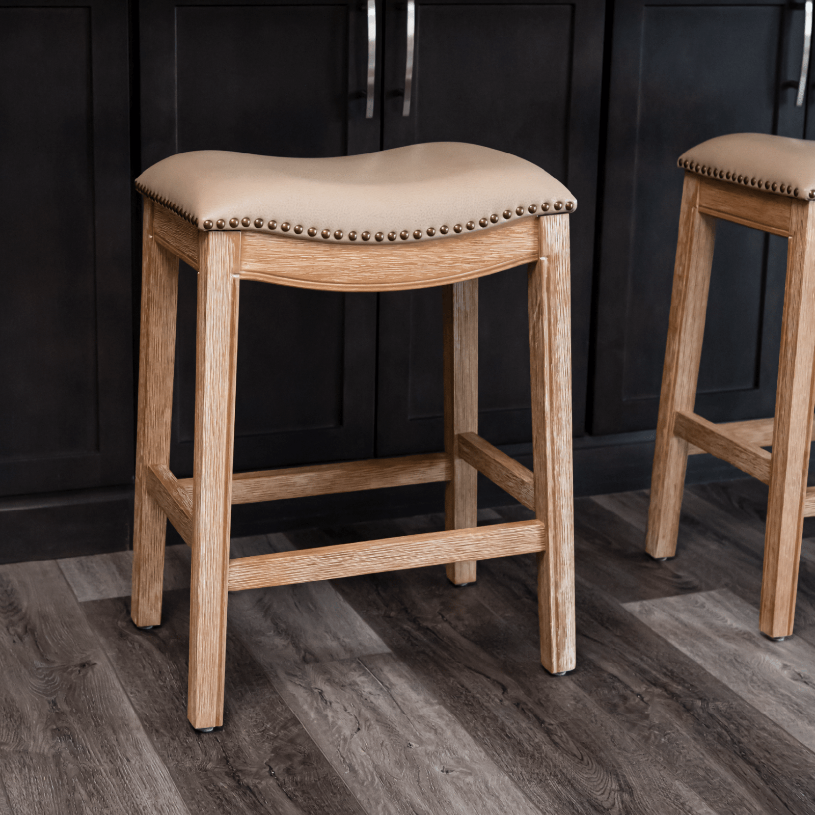 26" Adrien Saddle Counter Stool in Natural Finish with Beige Faux Leather (Set of 2) in Stools by Maven Lane