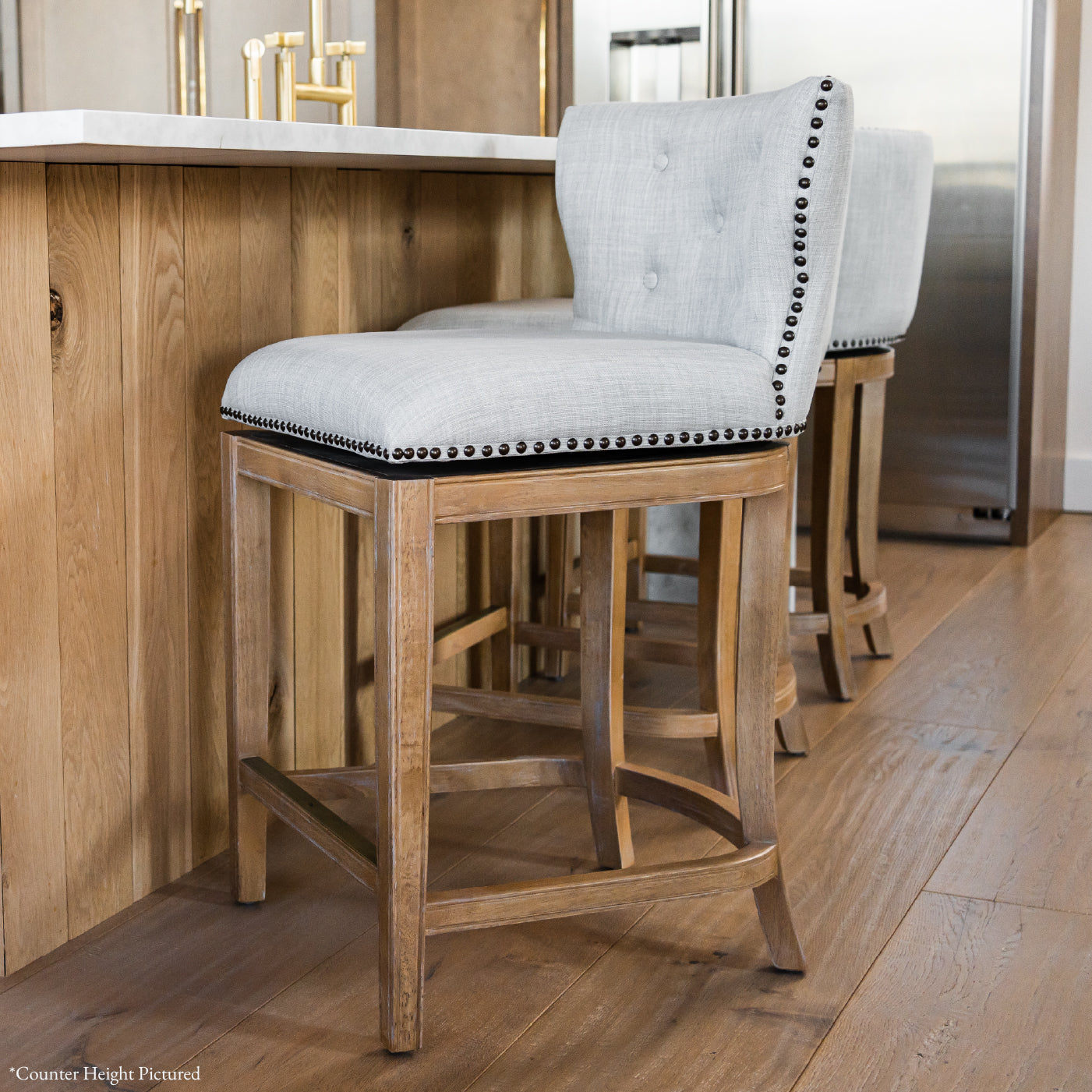 Hugo Bar Stool in Natural Finish with Light Grey Fabric Upholstery in Stools by Maven Lane