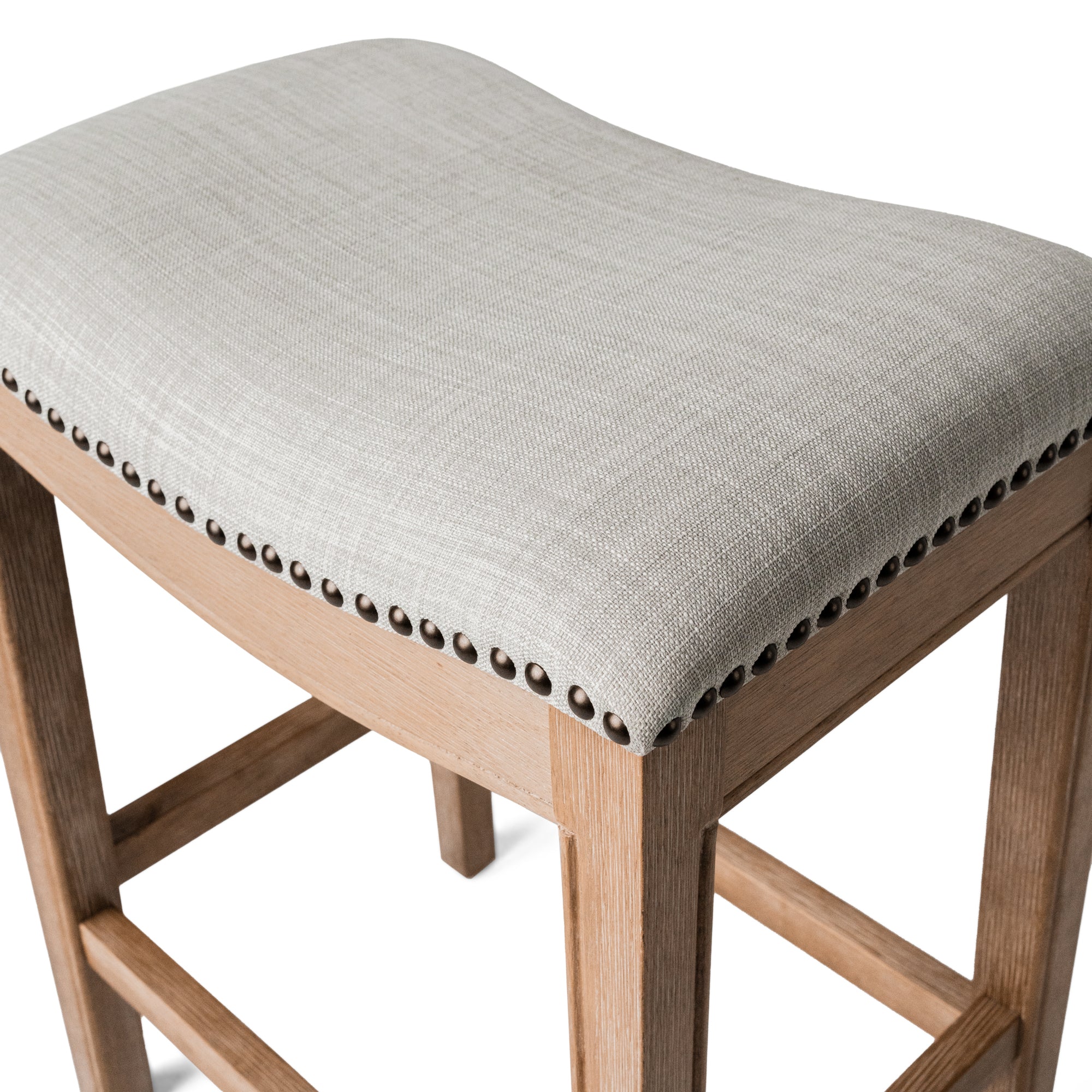 Adrien Saddle Counter Height Kitchen Stool - Weathered Oak Finish With Sand Color Fabric Upholstery in Stools by Maven Lane