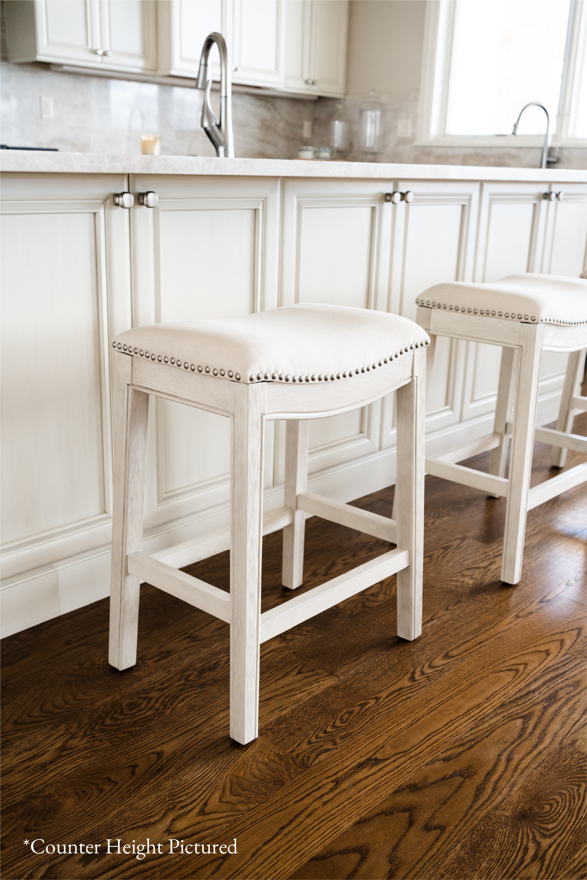 Adrien Saddle Bar Stool In White Oak Finish With Natural Fabric Upholstery in Stools by Maven Lane