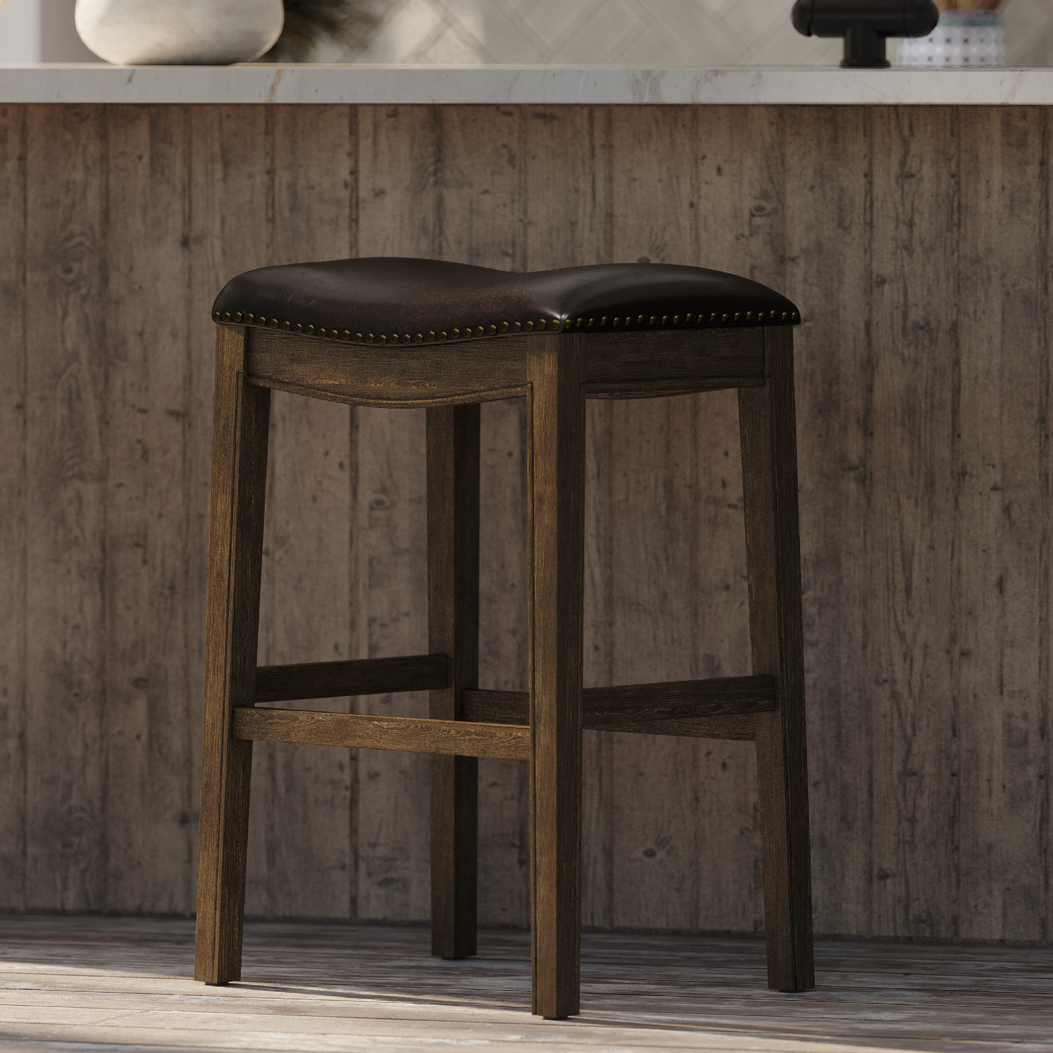 Adrien Saddle Bar Stool In Walnut Finish With Marksman Saddle Vegan Leather in Stools by Maven Lane