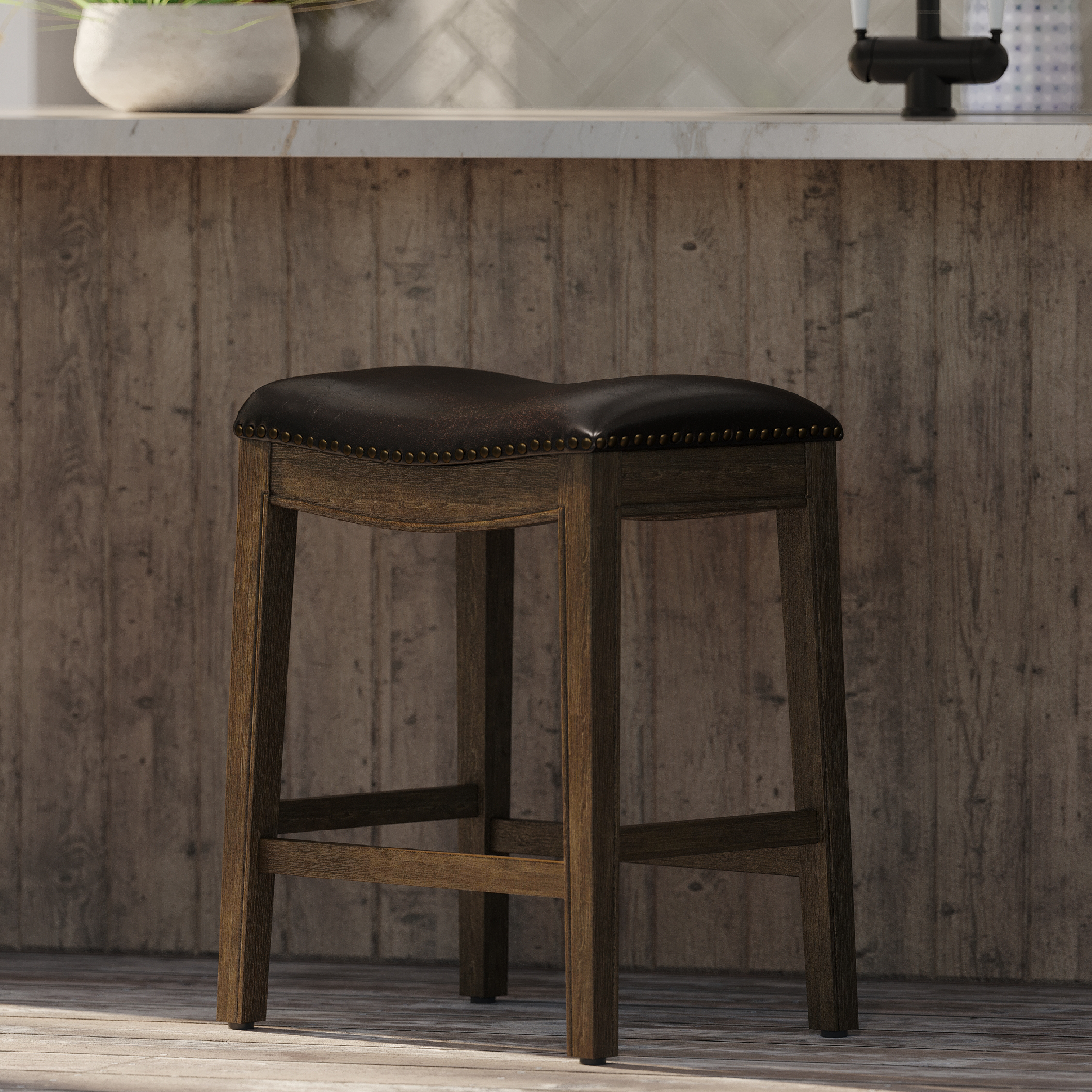 Adrien Saddle Counter Stool In Walnut Finish With Marksman Saddle Vegan Leather in Stools by Maven Lane