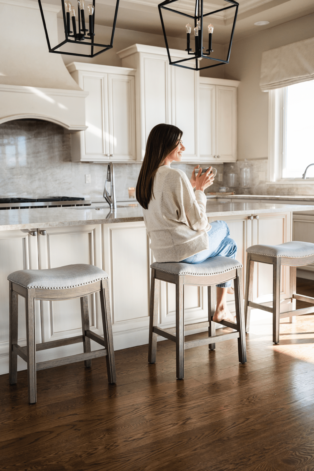 26" Adrien Saddle Counter Stool in Reclaimed Oak Finish with Ash Grey Fabric Upholstery in Stools by Maven Lane