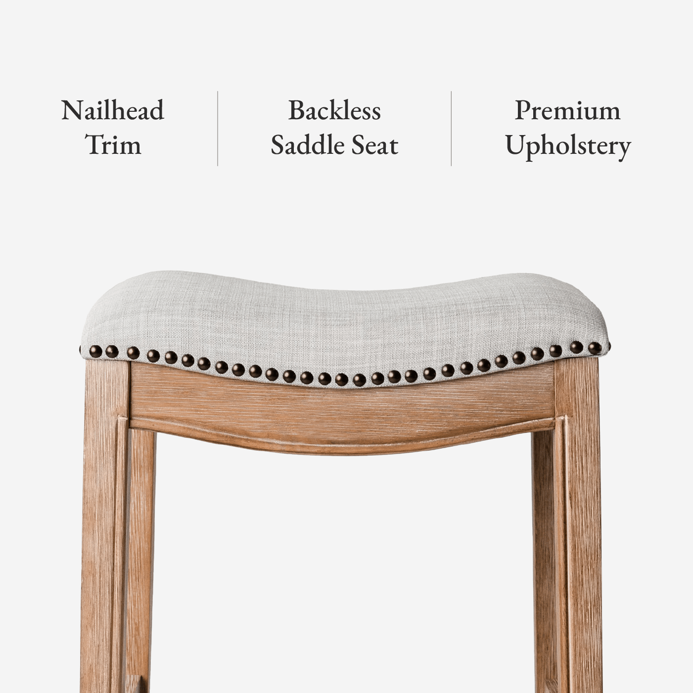 Adrien Saddle Counter Stool in Natural Finish with Light Grey Fabric Upholstery in Stools by Maven Lane