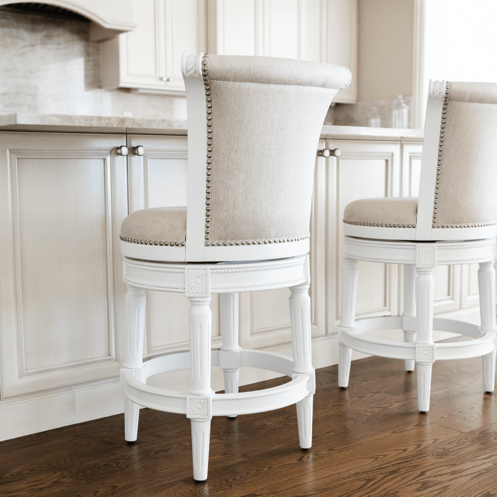 26" Pullman swivel counter height kitchen stool - alabaster white finish with cream fabric upholstery in Stools by Maven Lane