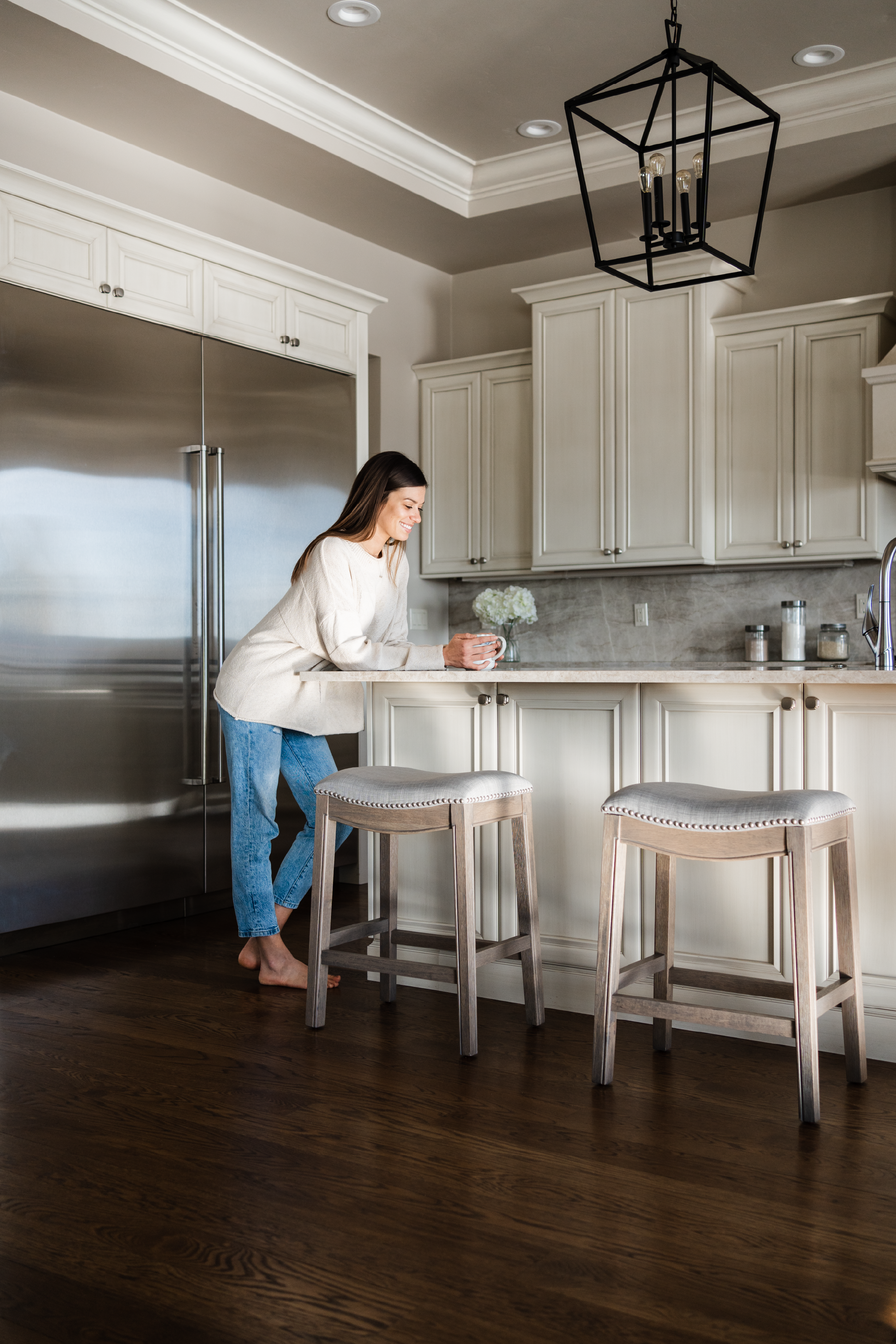 Adrien Saddle Counter Height Kitchen Stool - Reclaimed Oak Finish With Ash Grey Fabric Upholstery in Stools by Maven Lane