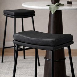 Berkley Bar Height Saddle Stool – Charcoal Faux Leather & Matte Black in Maven Lane by Maven Lane