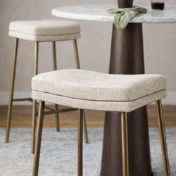 Berkley Bar Height Saddle Stool – Beige Fabric & Aged Gold in Maven Lane by Maven Lane