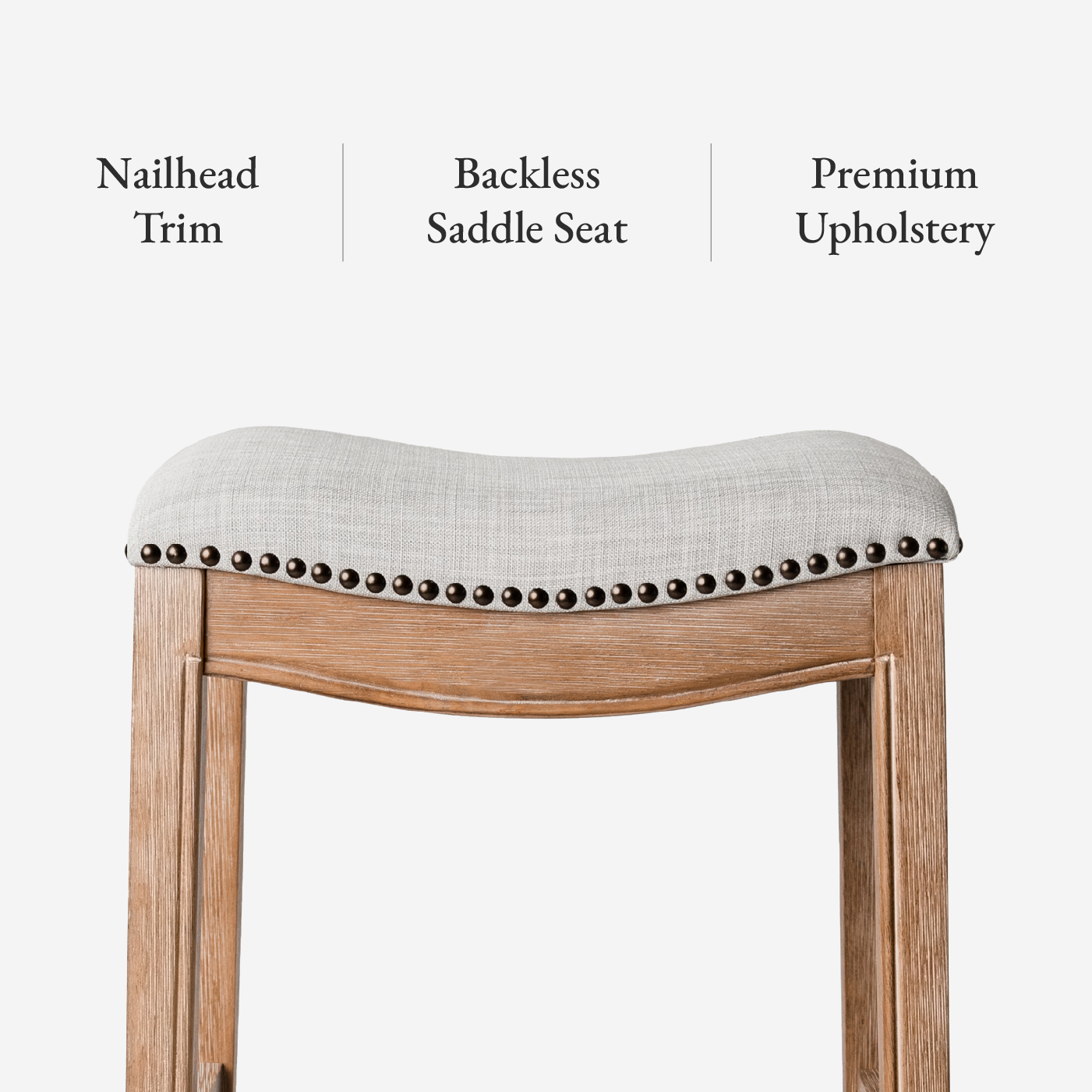 Adrien Saddle Bar Stool In Weathered Oak Finish With Sand Color Fabric Upholstery in Stools by Maven Lane