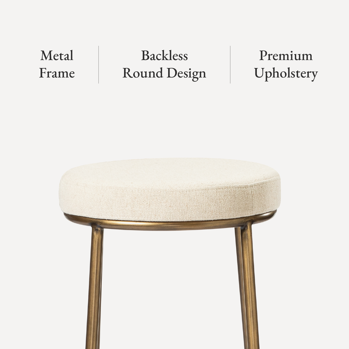 Stella Bar Stool In Antique Brass Finish With Light Beige Fabric Upholstery in Stools by Maven Lane