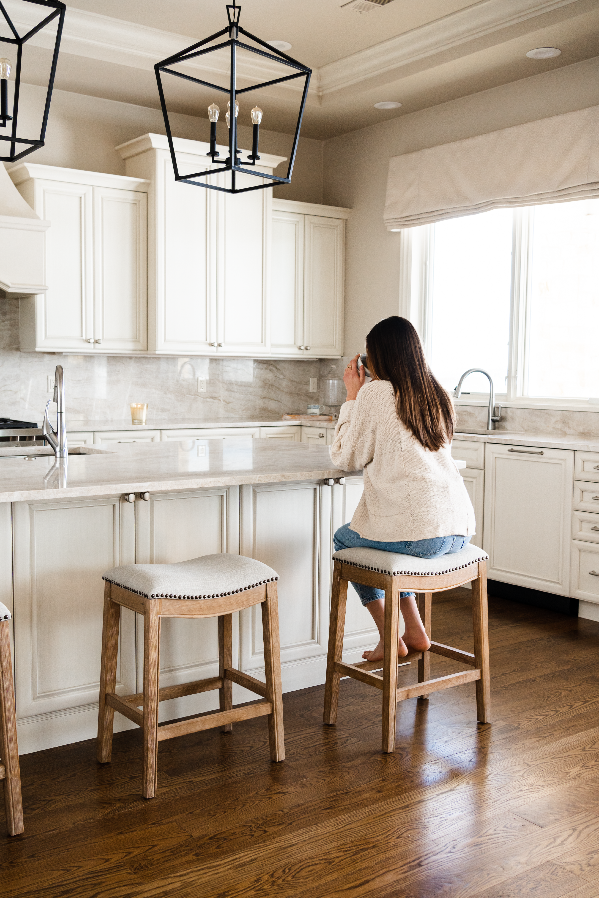 Adrien Saddle Counter Height Kitchen Stool - Weathered Oak Finish With Sand Color Fabric Upholstery in Stools by Maven Lane